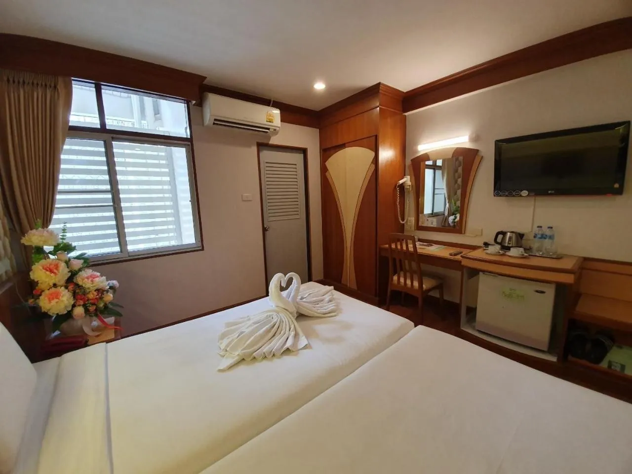 air conditioner, Bed in Sakol Hotel