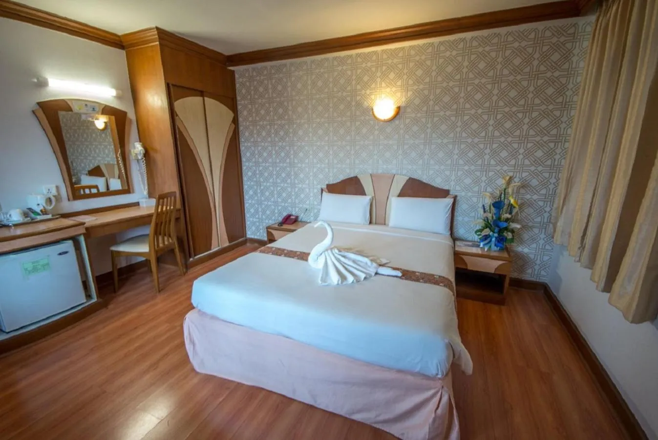 Bed in Sakol Hotel