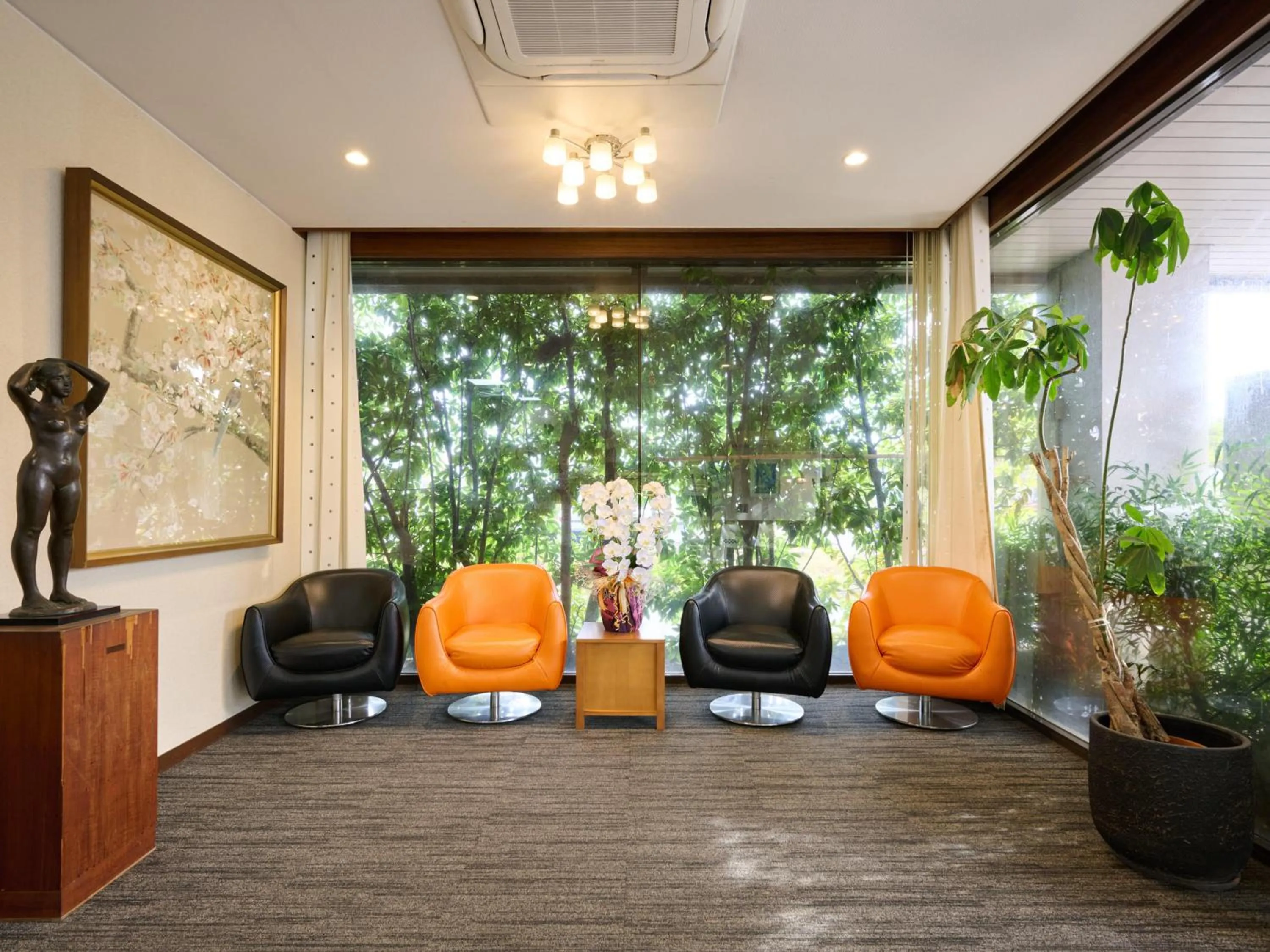 Lobby or reception in Okasan Hotel