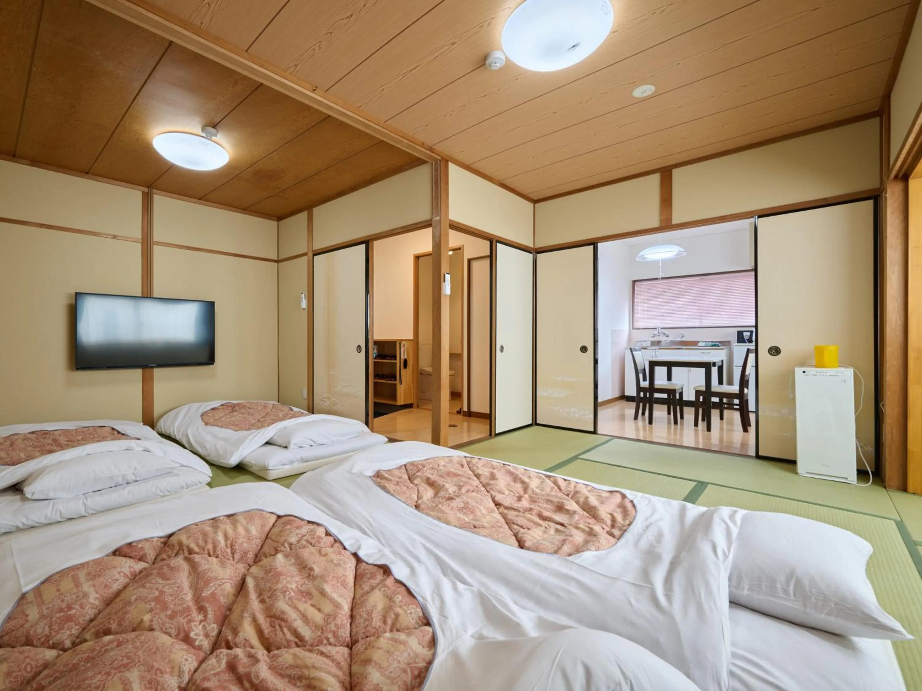 Photo of the whole room, Bed in Okasan Hotel