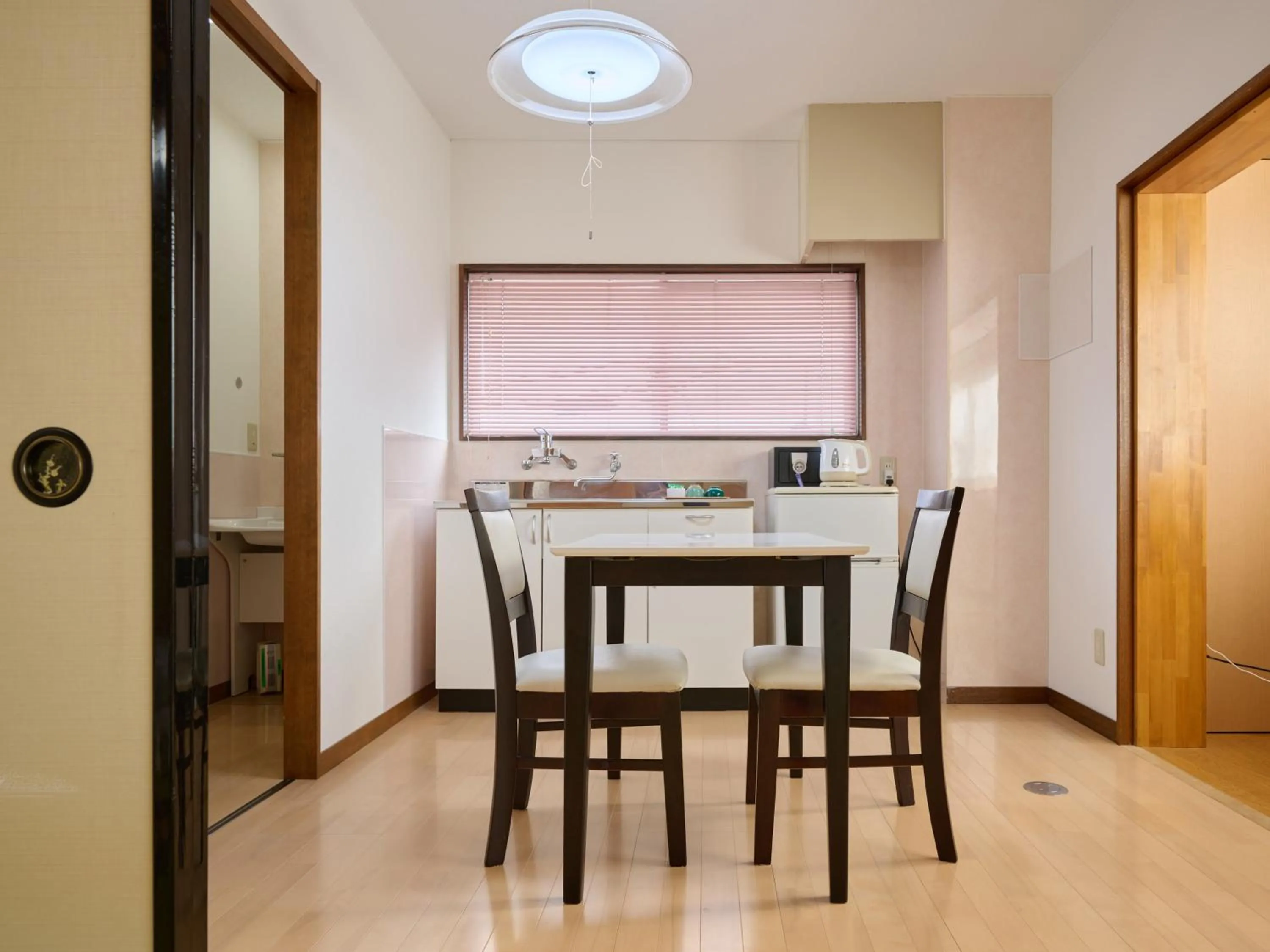 Photo of the whole room in Okasan Hotel