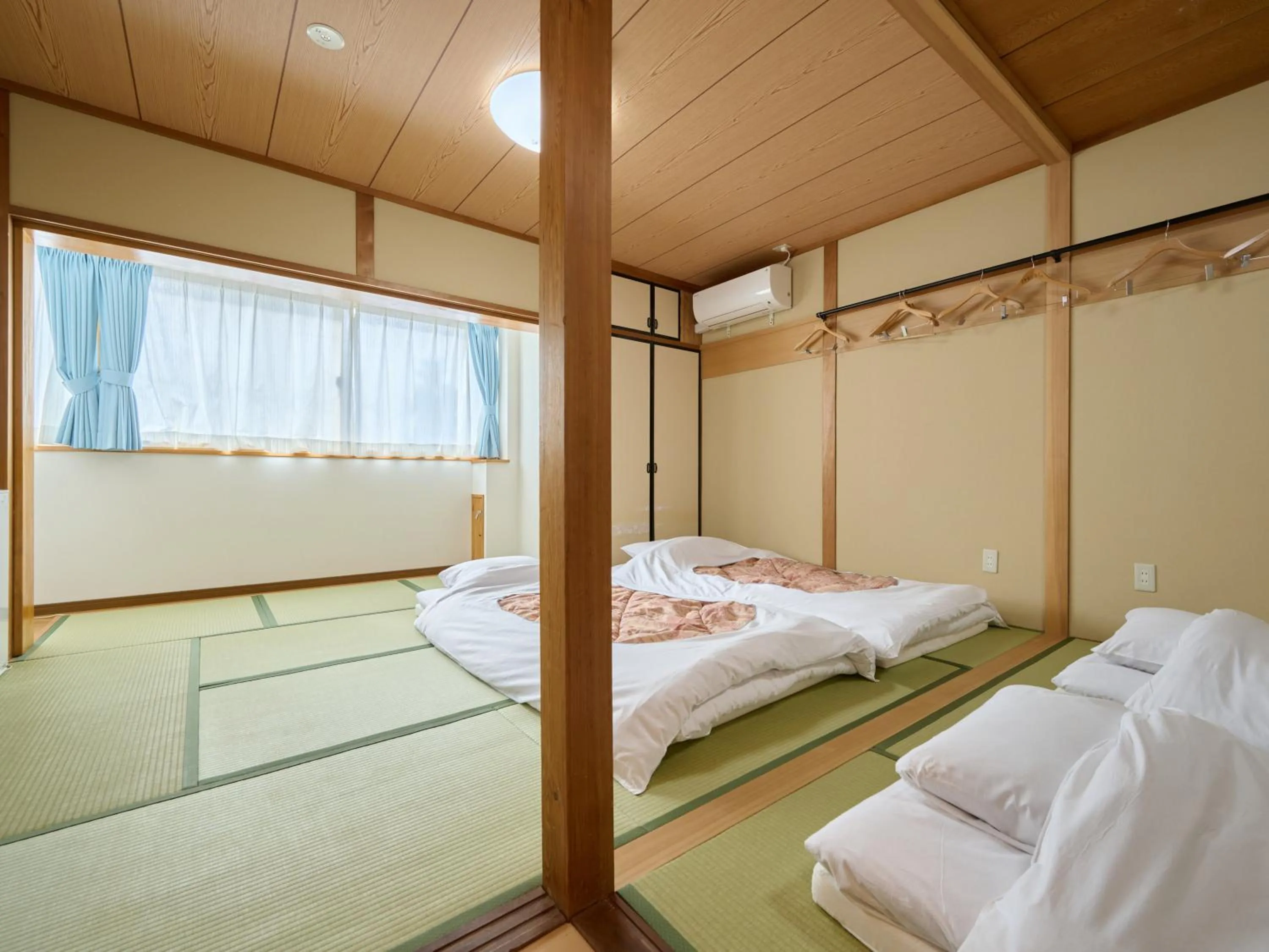 Photo of the whole room, Bed in Okasan Hotel