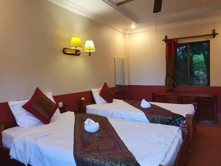 Bed in Phoumrumduol Bungalow