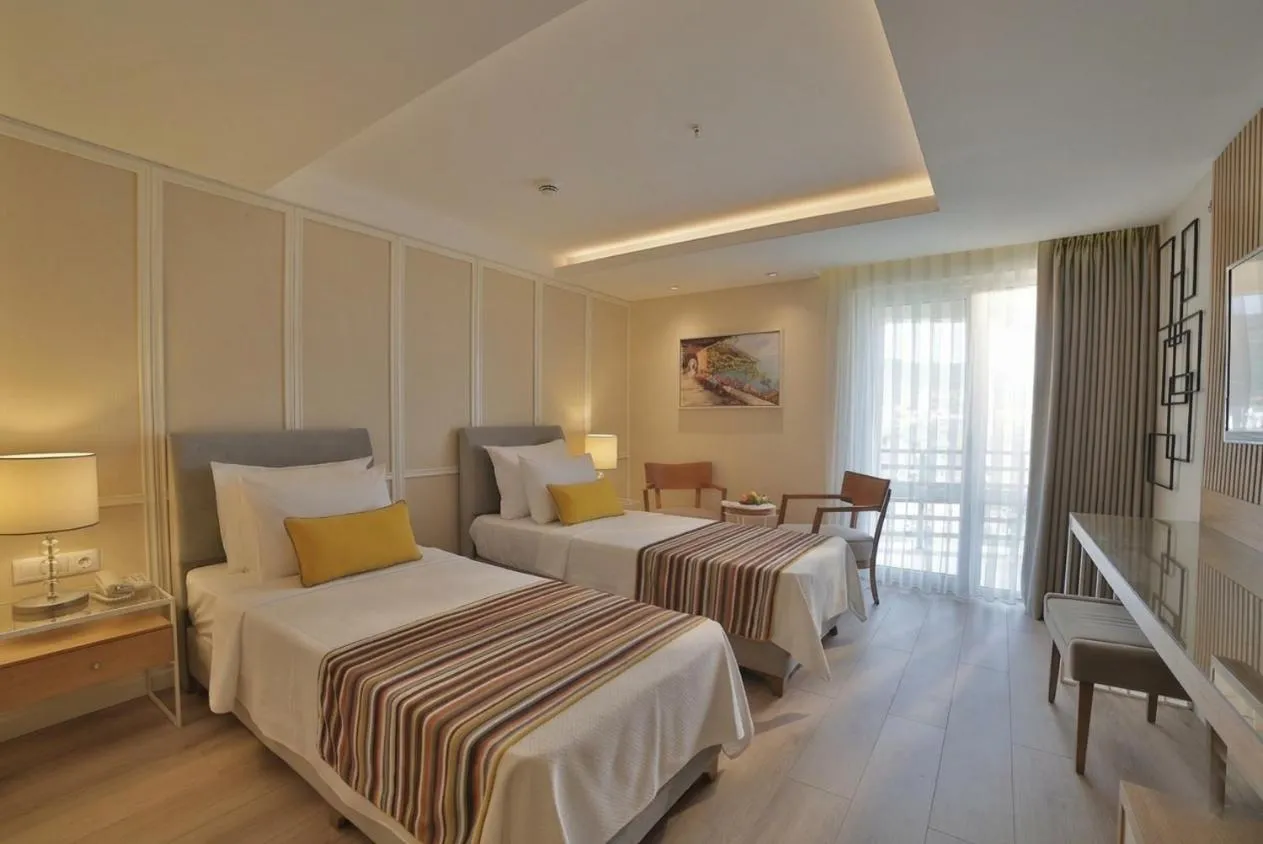 Bed in Rawda Resort Hotel Altinoluk