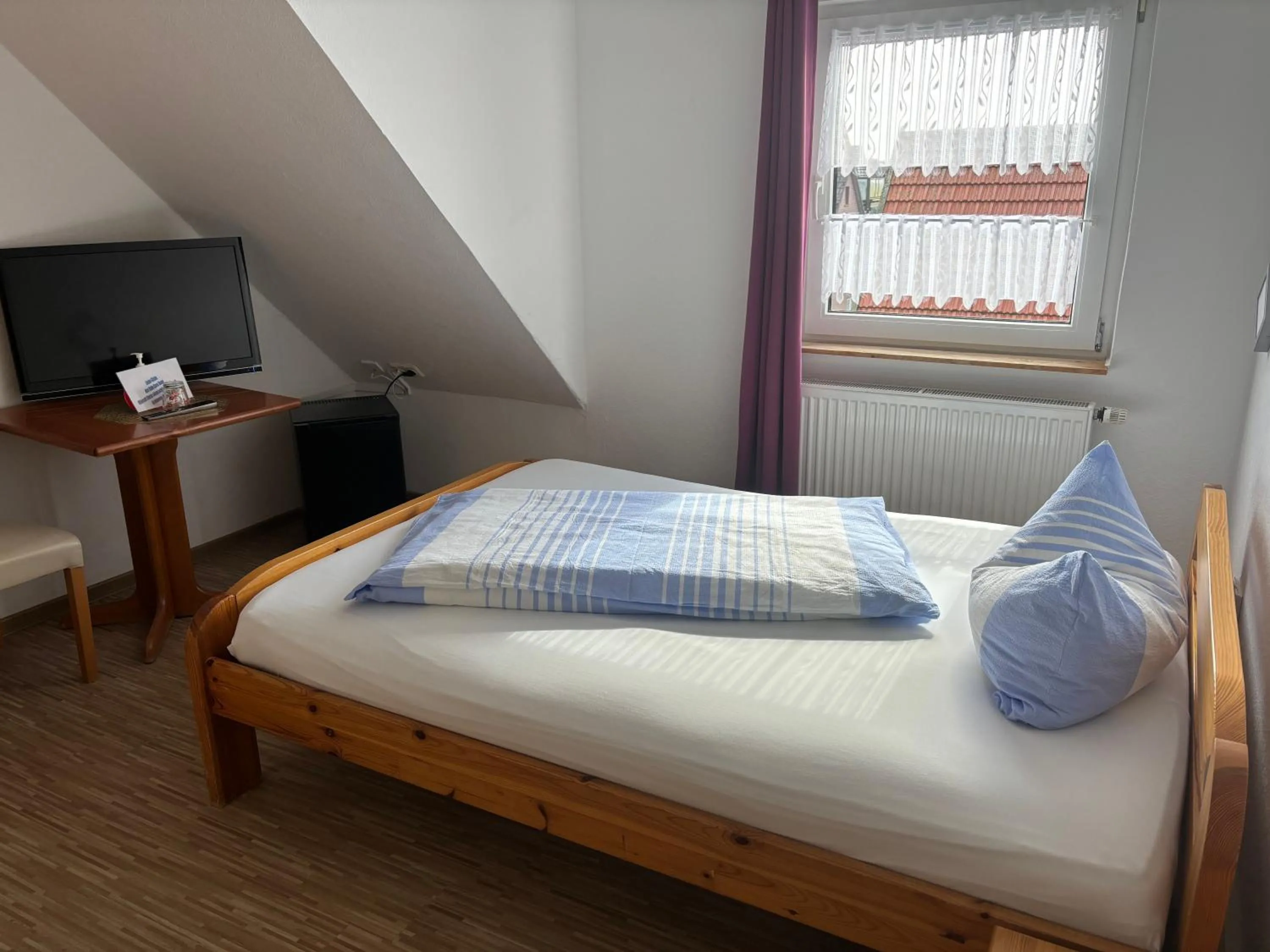 Bed in Hotel-Restaurant Cafe Caro