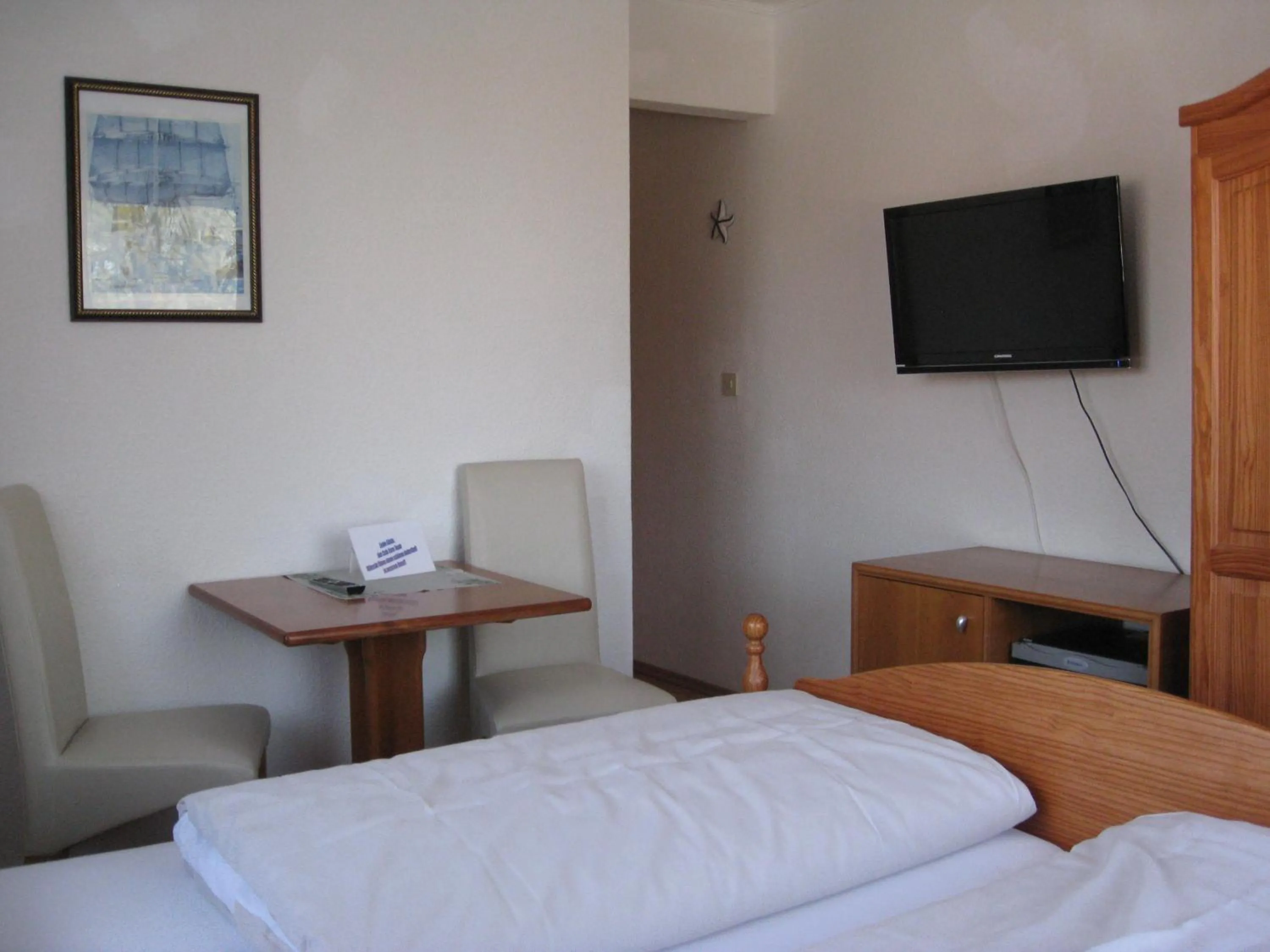 Photo of the whole room, Bed in Hotel-Restaurant Cafe Caro