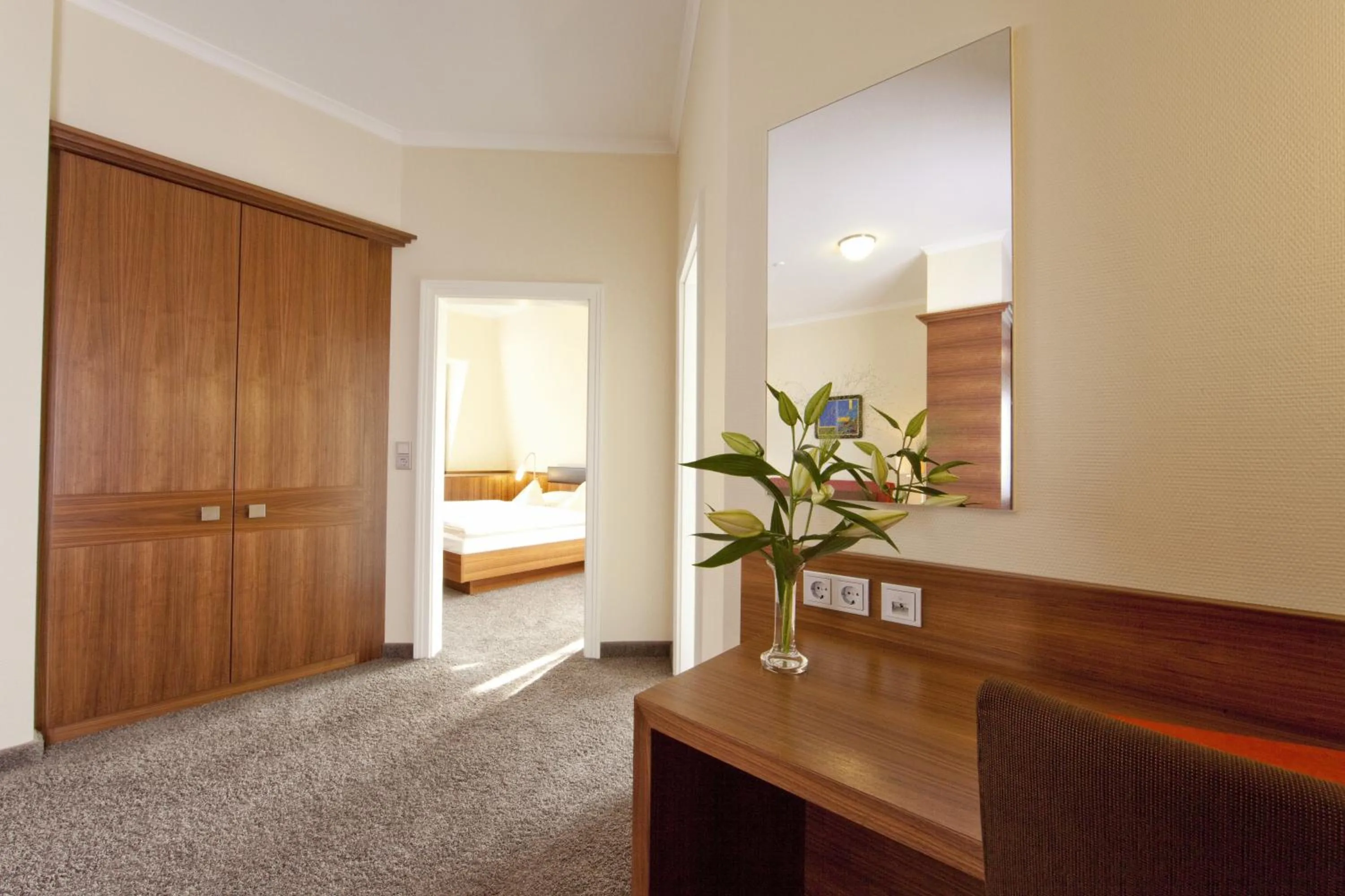 Living room, Bed in Hotel Weis