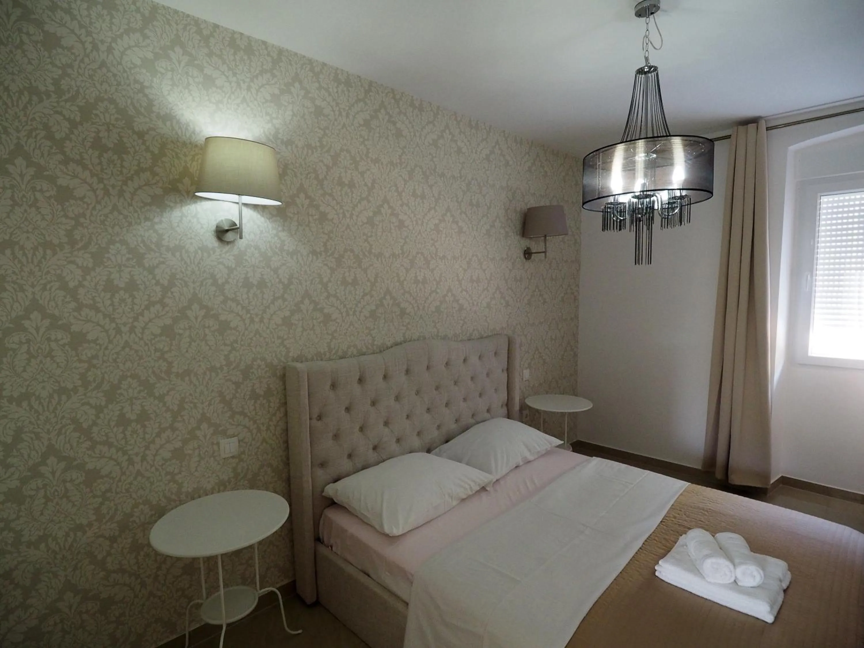 Bed in Captain Emo City Apartments