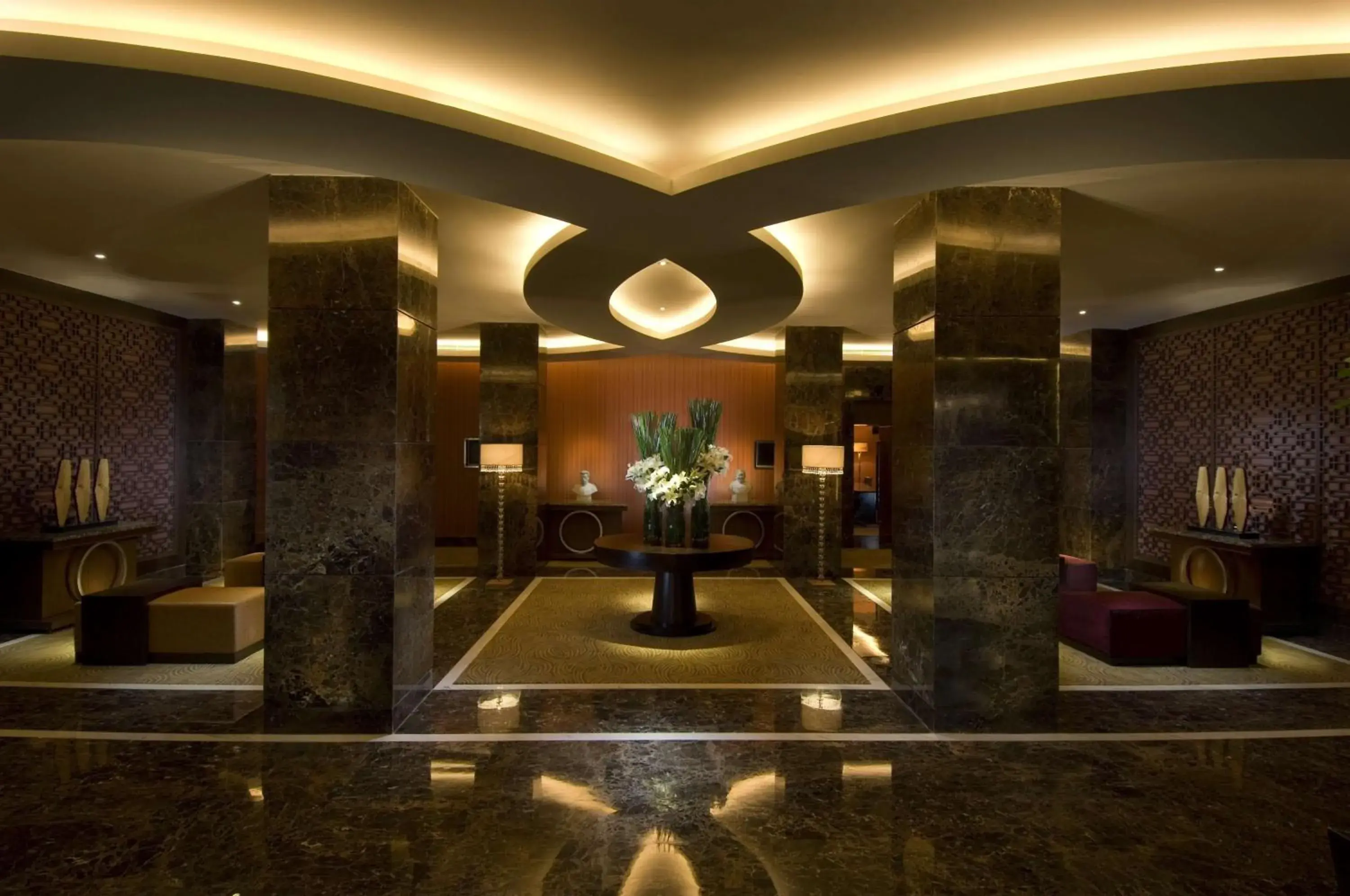 Lobby or reception in Hilton Beijing - Close to Capital Airport Express Subway & Liangma River located in the Embassy area Lobby or reception in Hilton Beijing - Close to Capital Airport Express Subway & Liangma River located in the Embassy area