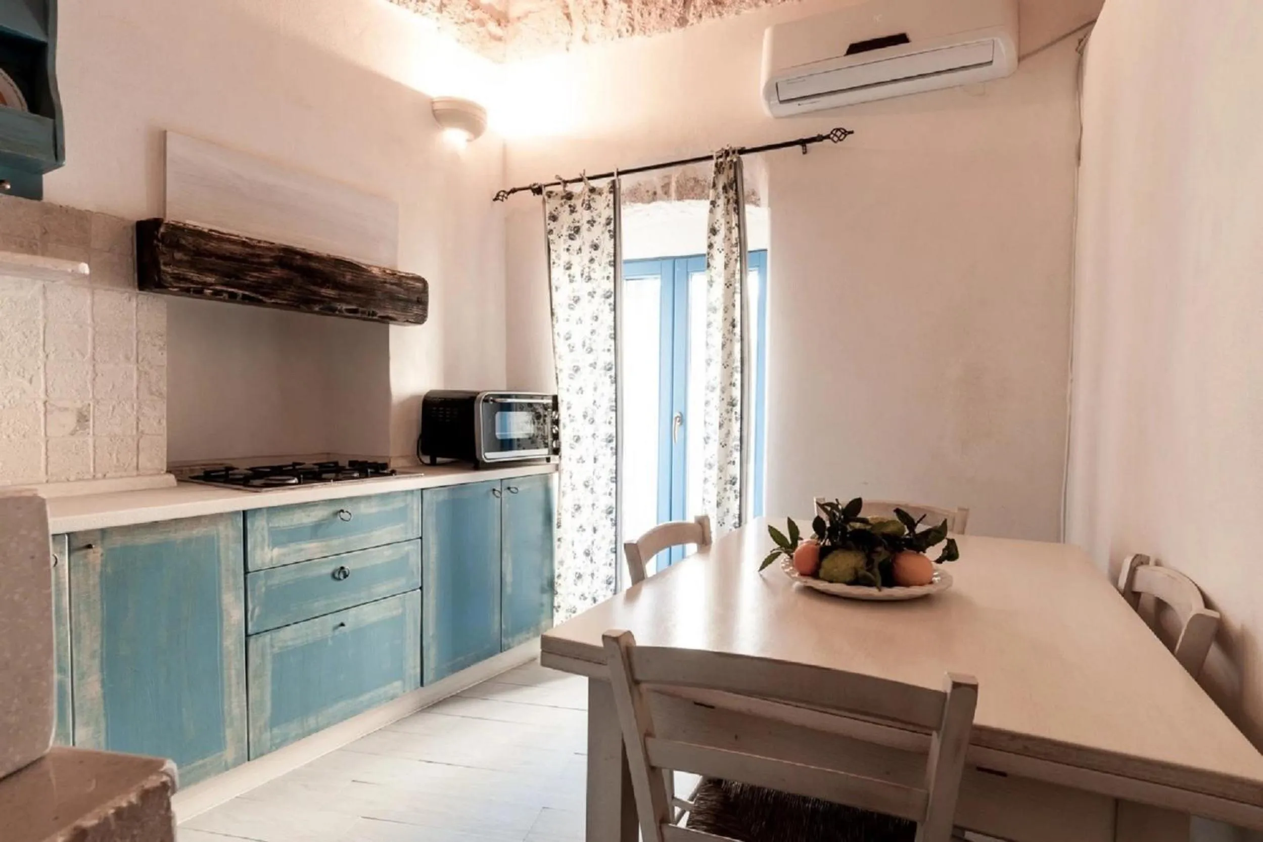 Kitchen or kitchenette in Le Piccole Case Bianche