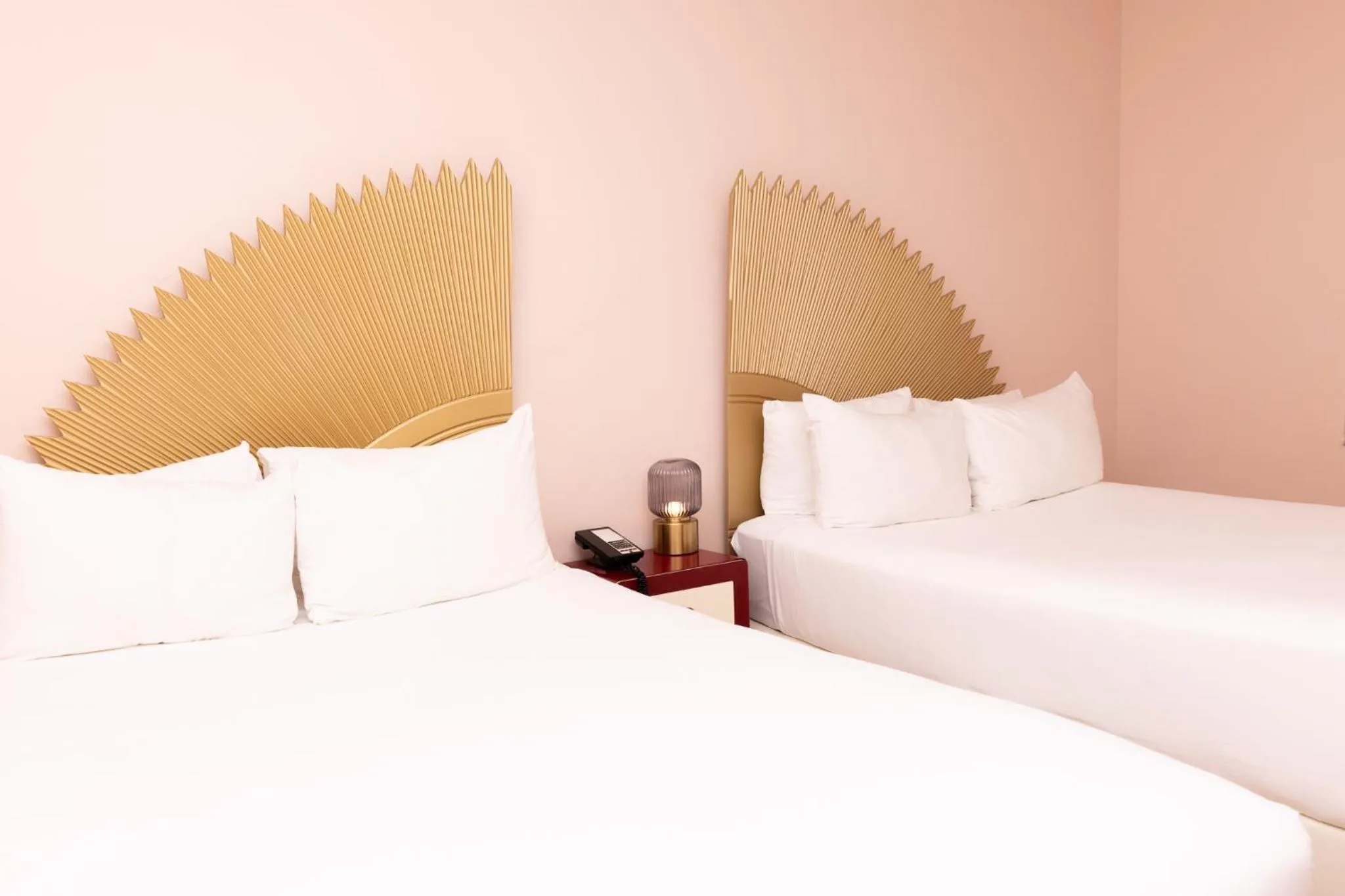 Bed in Crest Hotel Suites