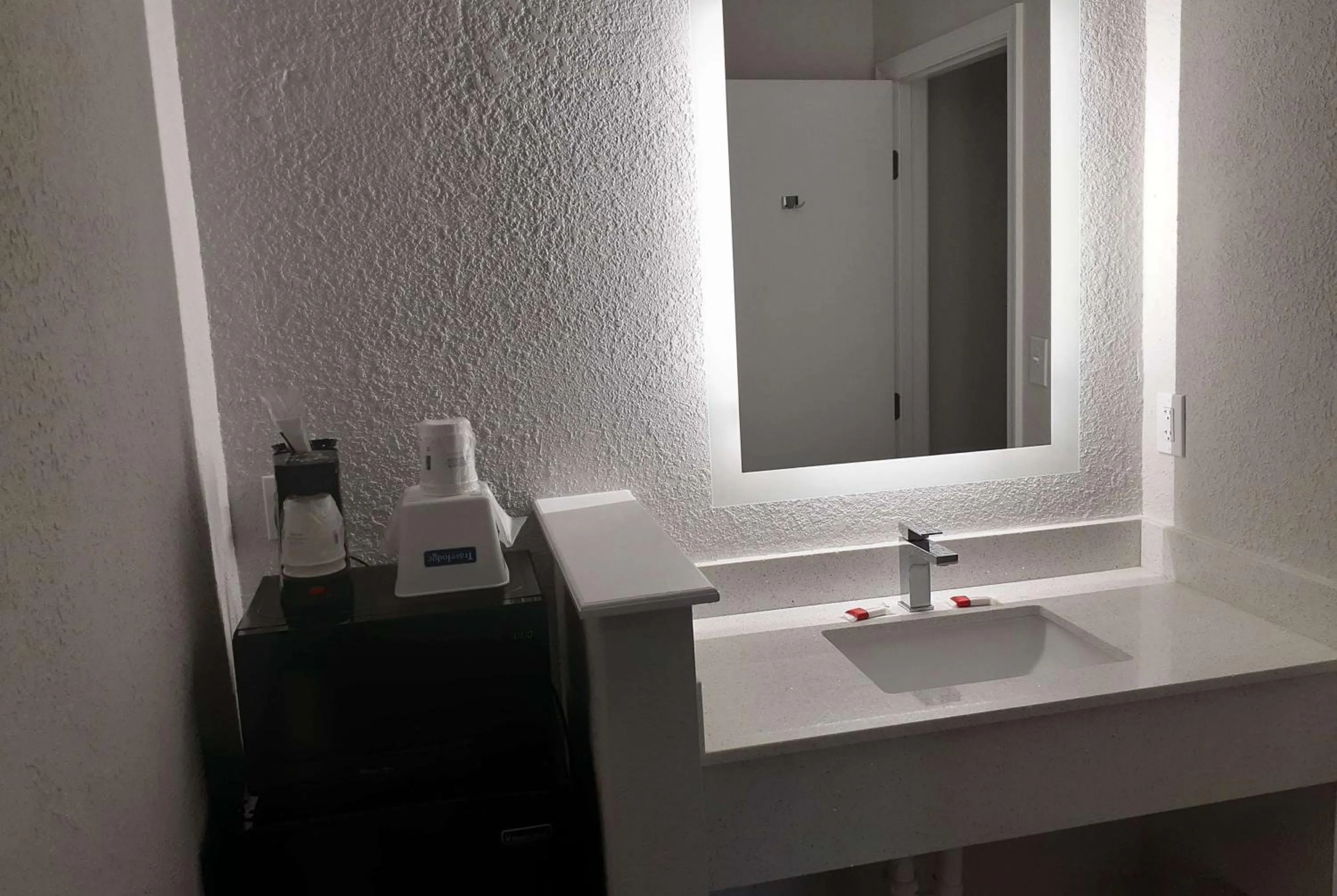 Bathroom in Travelodge by Wyndham Virginia Beach Bay Beach