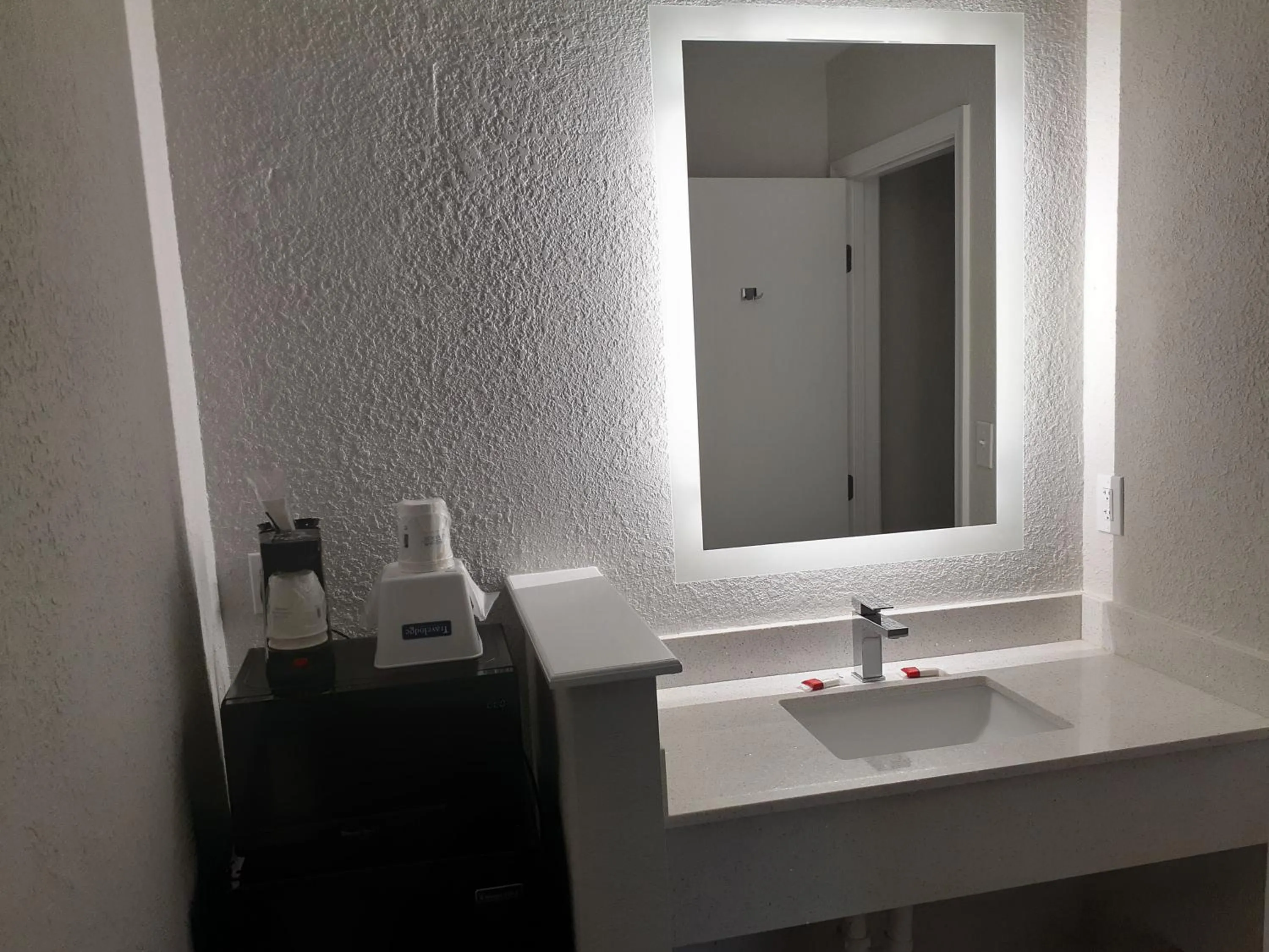 Bathroom in Travelodge by Wyndham Virginia Beach Bay Beach