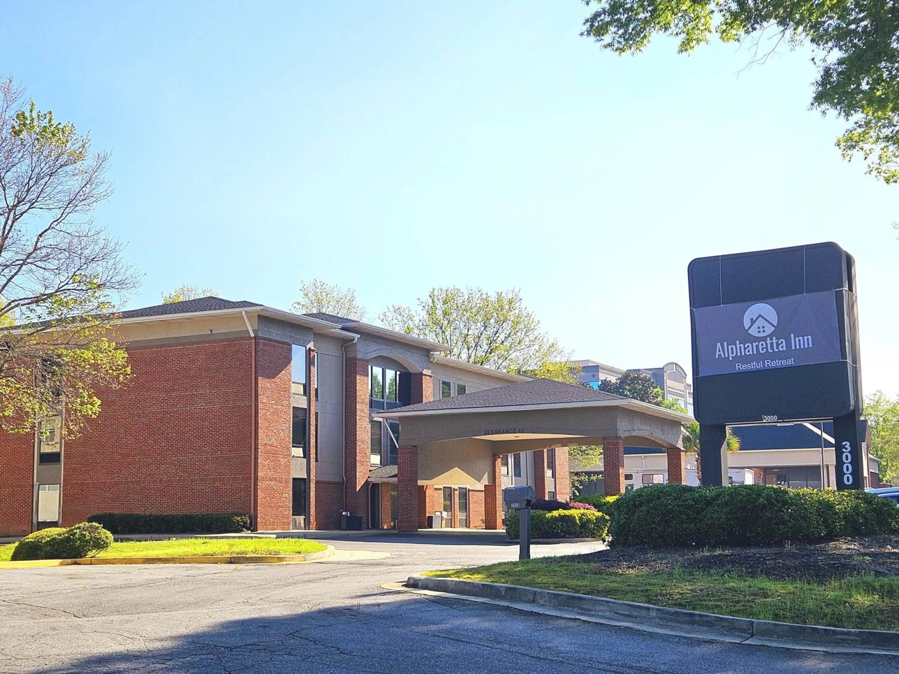 Property building in Country Inn & Suites by Radisson, Alpharetta, GA