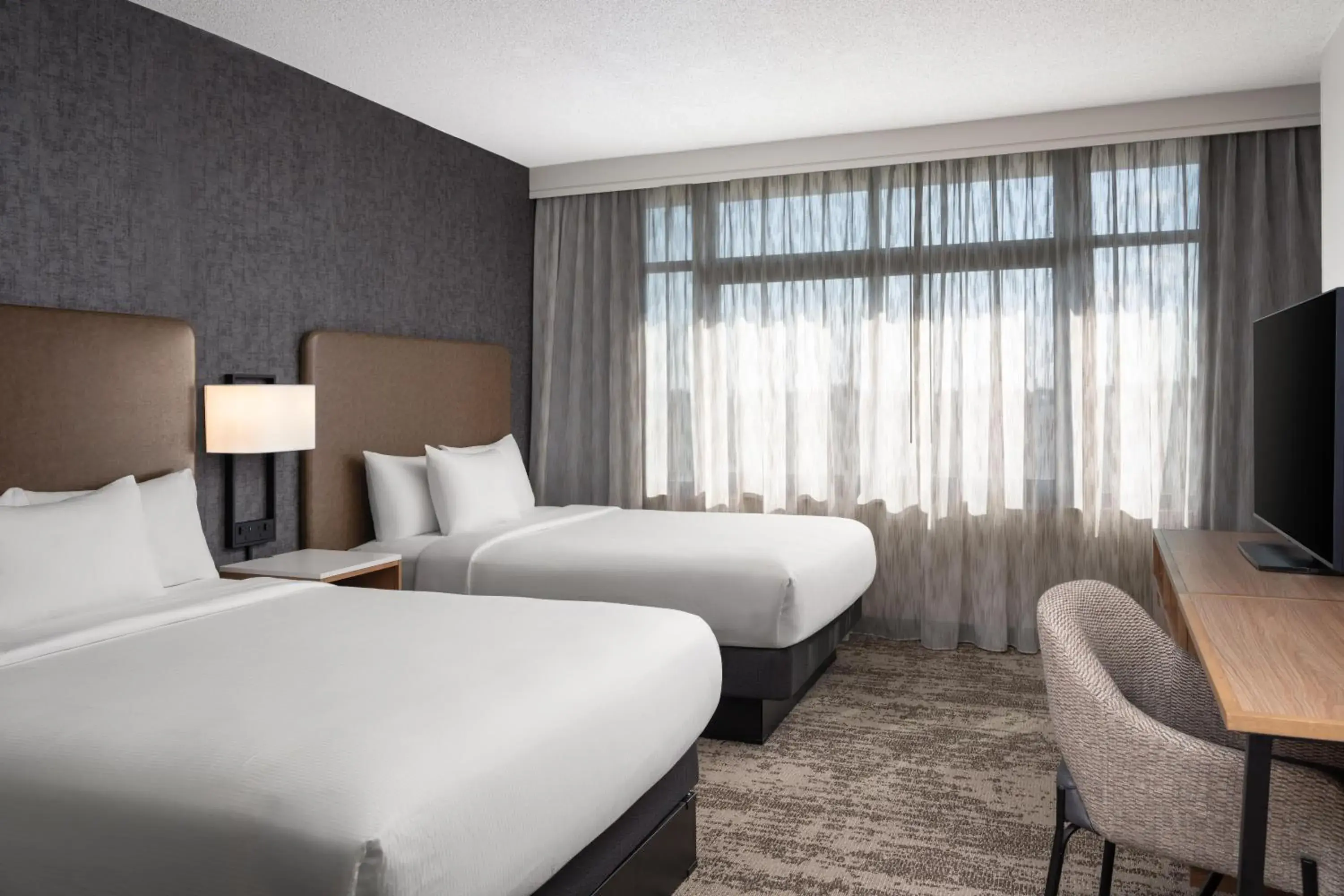 Bed in Embassy Suites by Hilton at Hot Springs Convention Center Bed in Embassy Suites by Hilton at Hot Springs Convention Center