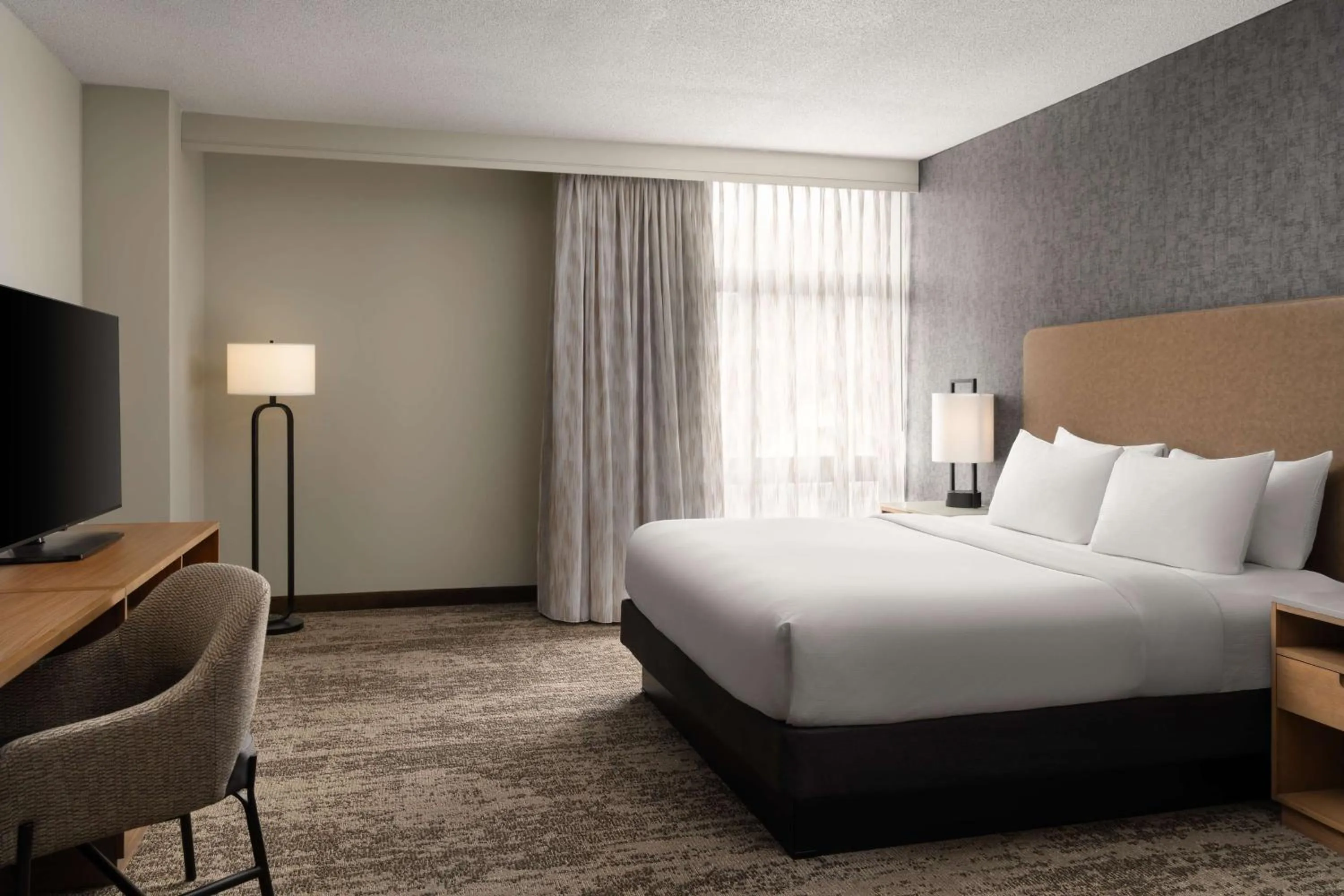 Bed in Embassy Suites by Hilton at Hot Springs Convention Center