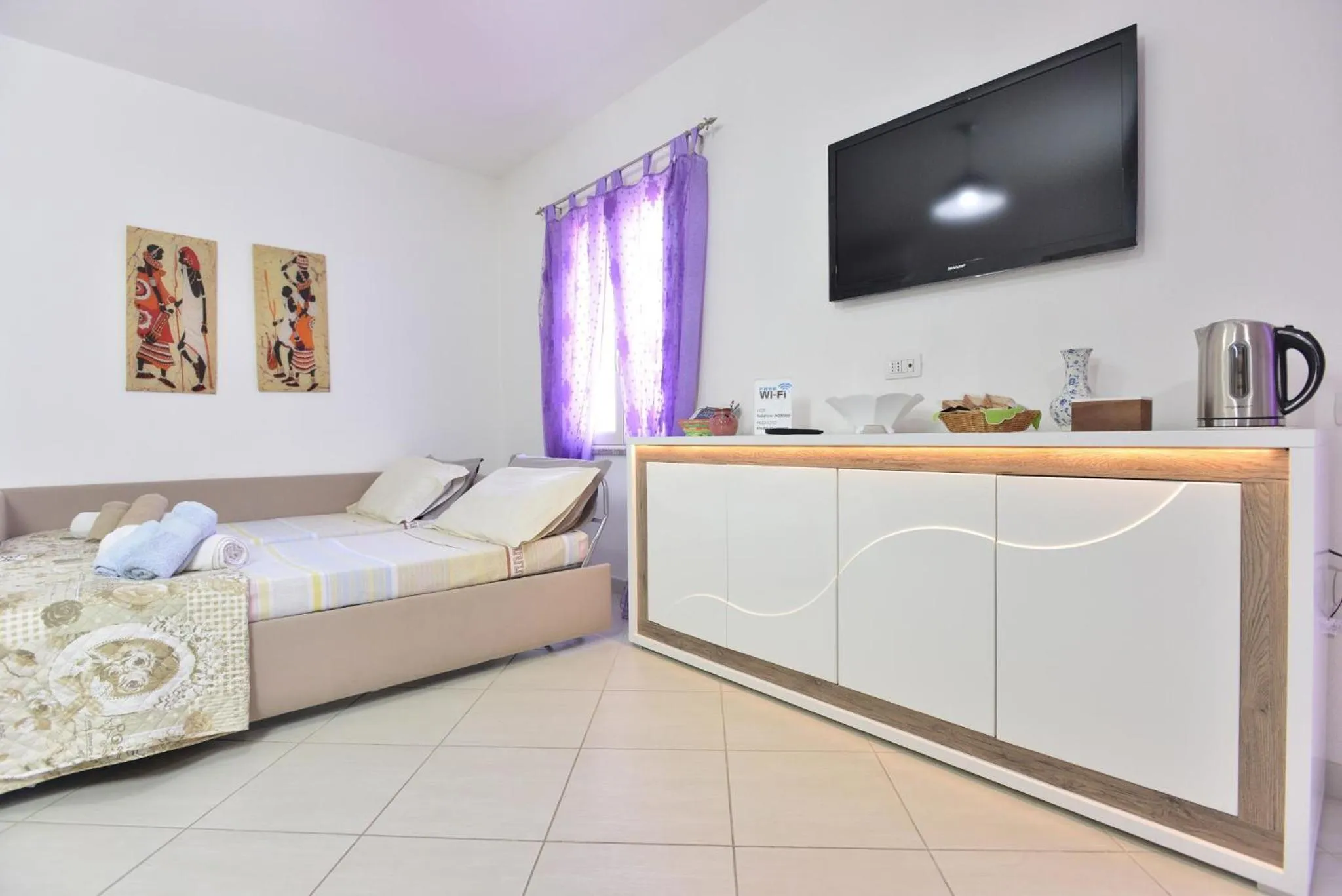 TV and multimedia, Bed in IzzHome Regina Margherita