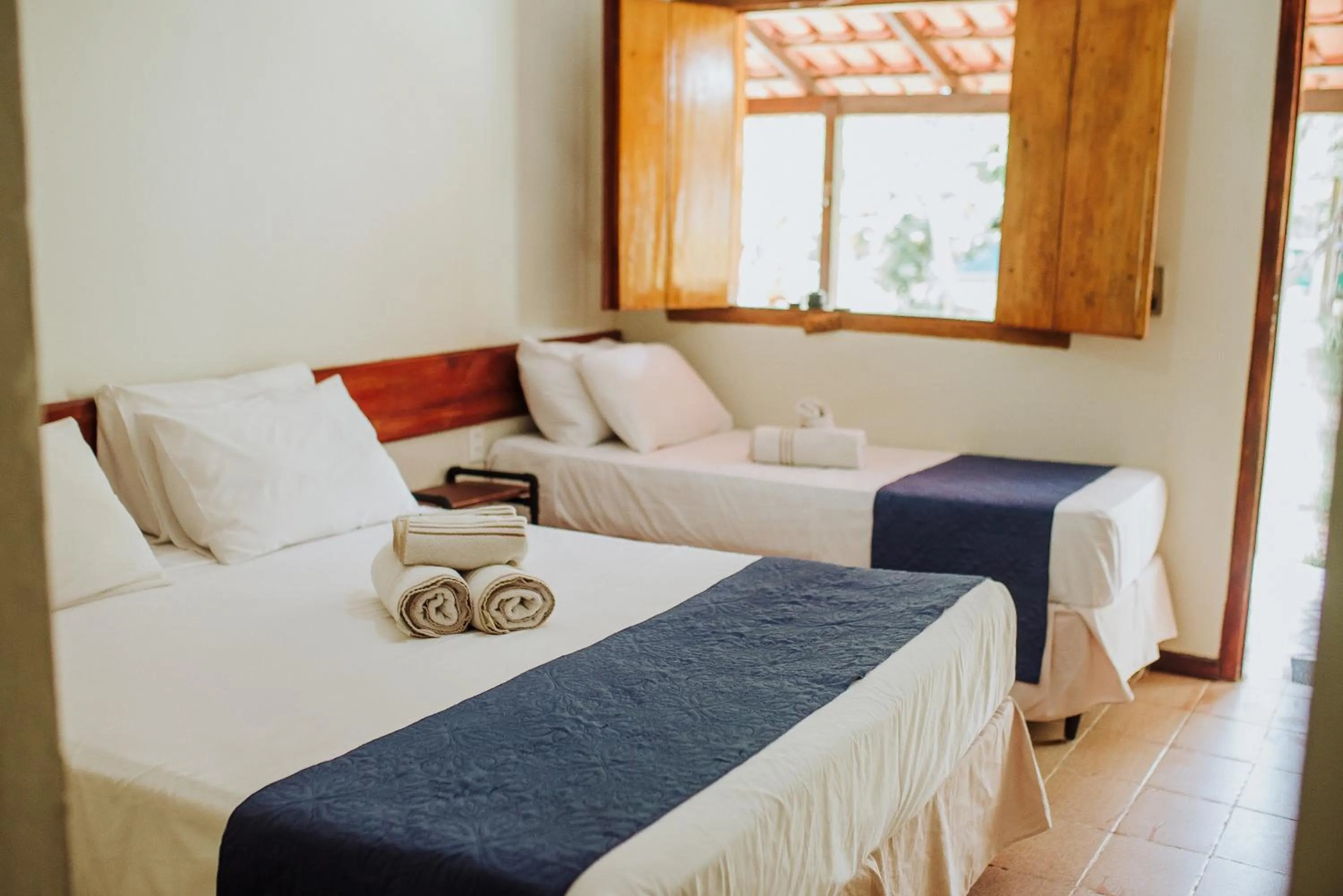 Bed in Pousada Estalagem Vila Tania