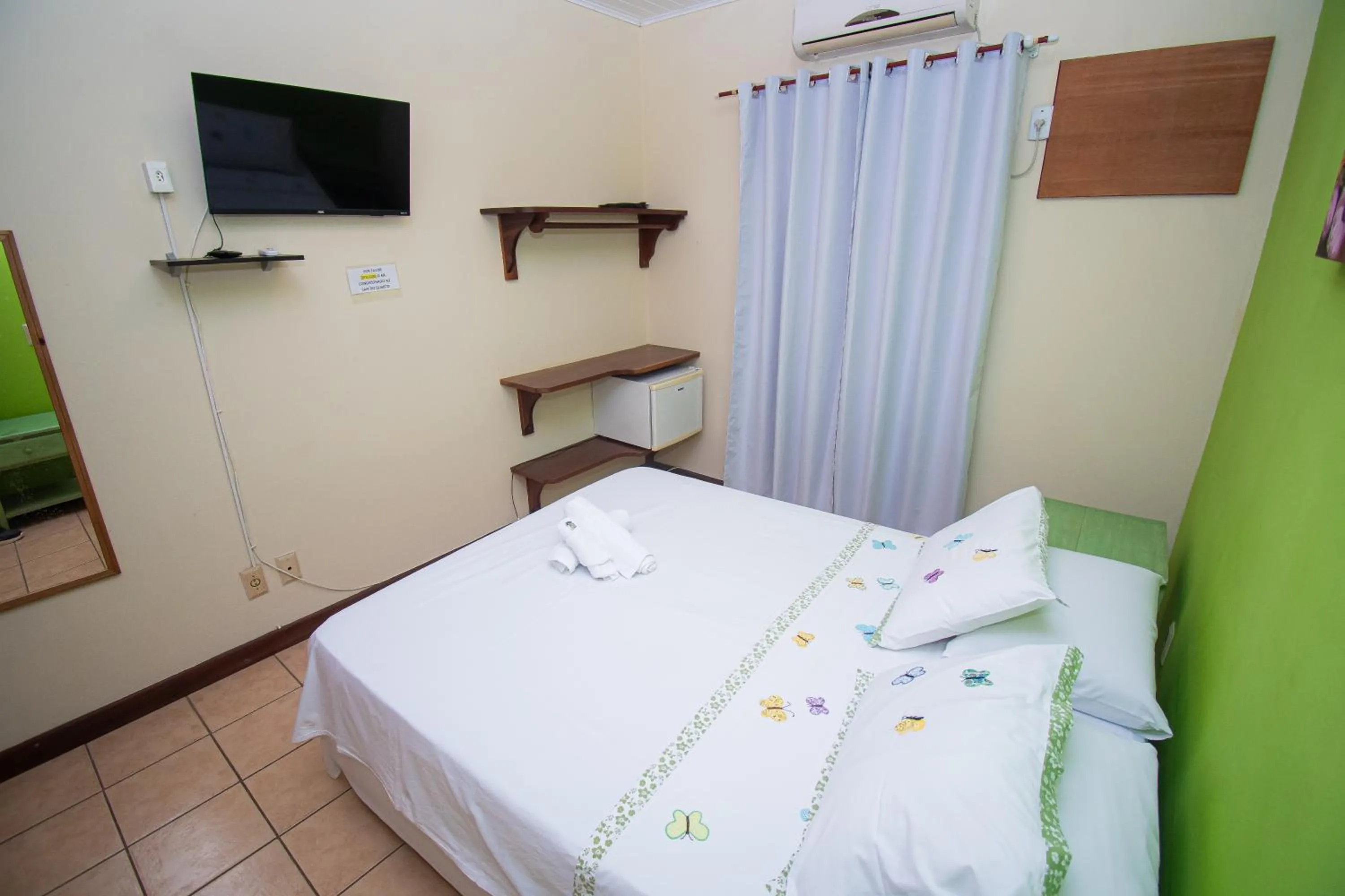 Bed in Pousada Brisa de Paraty