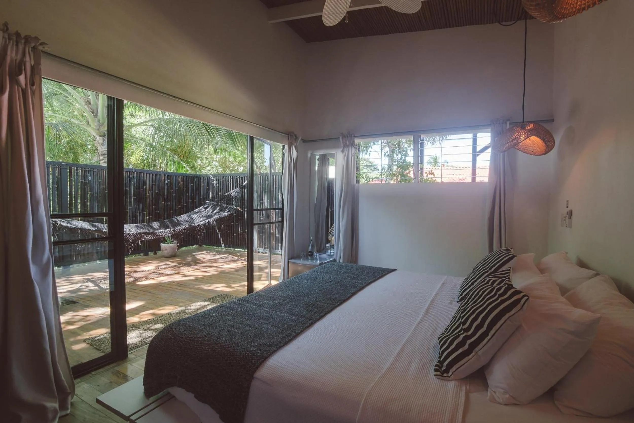 Photo of the whole room, Bed in La Negra Surf Hotel