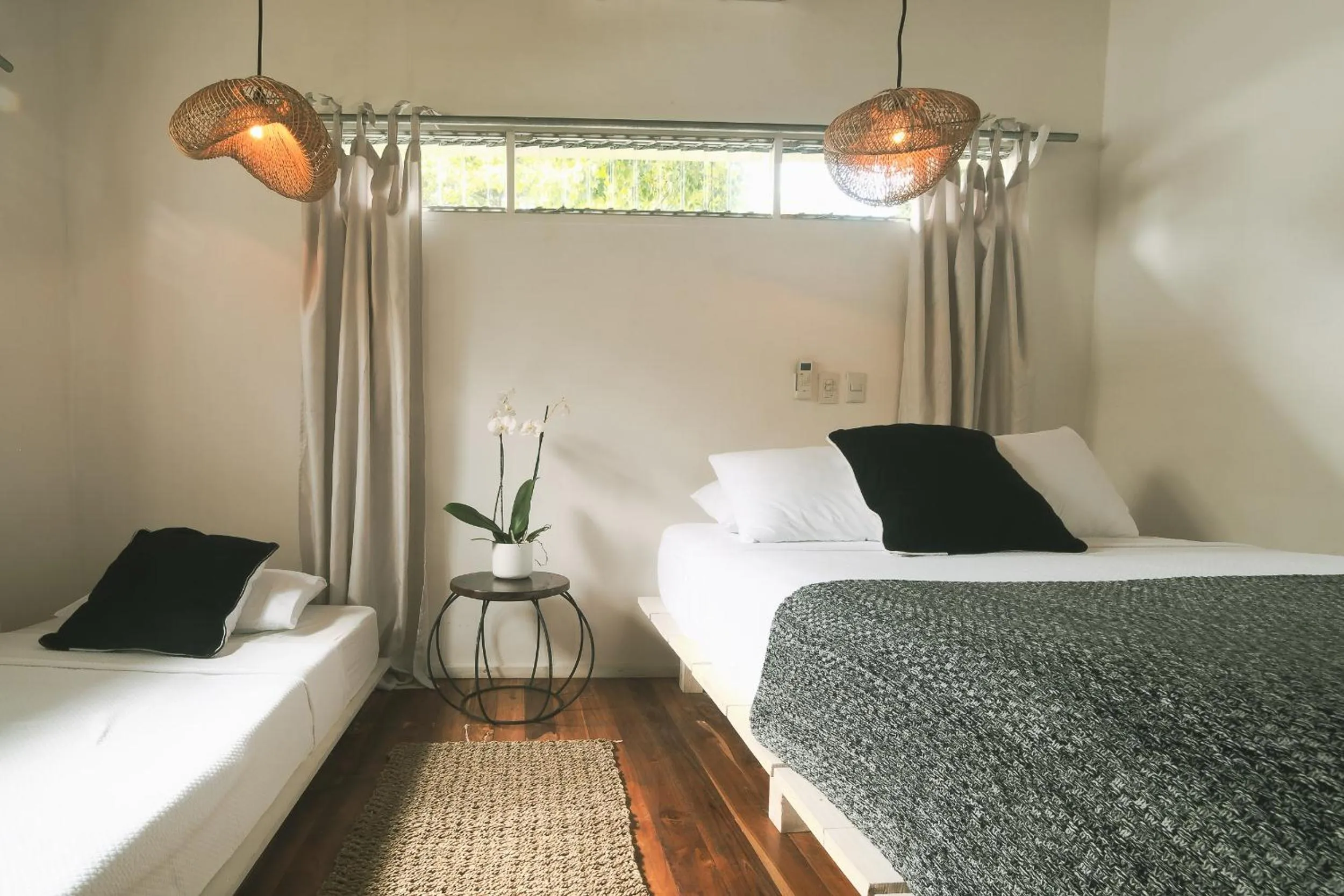 Photo of the whole room, Bed in La Negra Surf Hotel