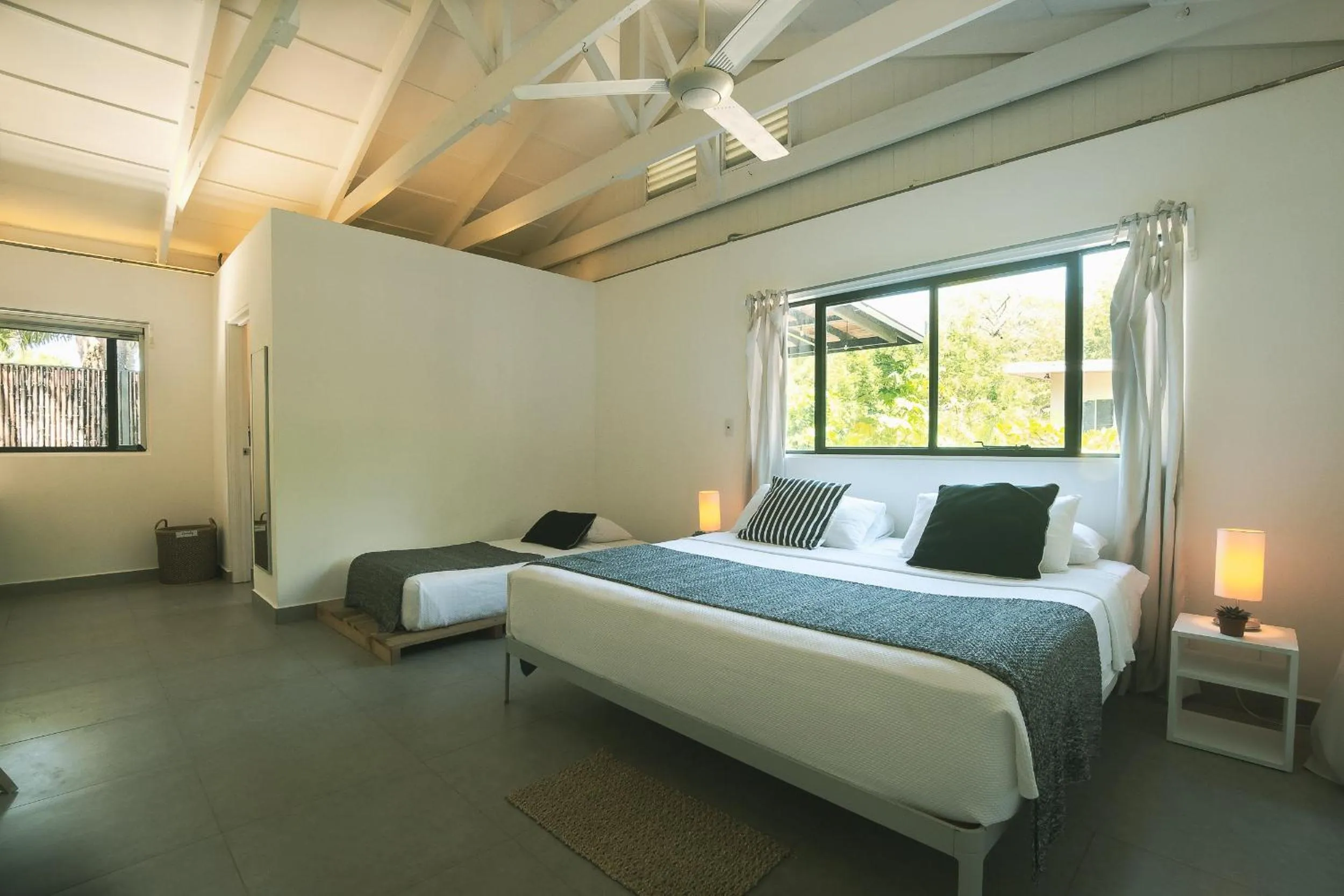 Photo of the whole room, Bed in La Negra Surf Hotel