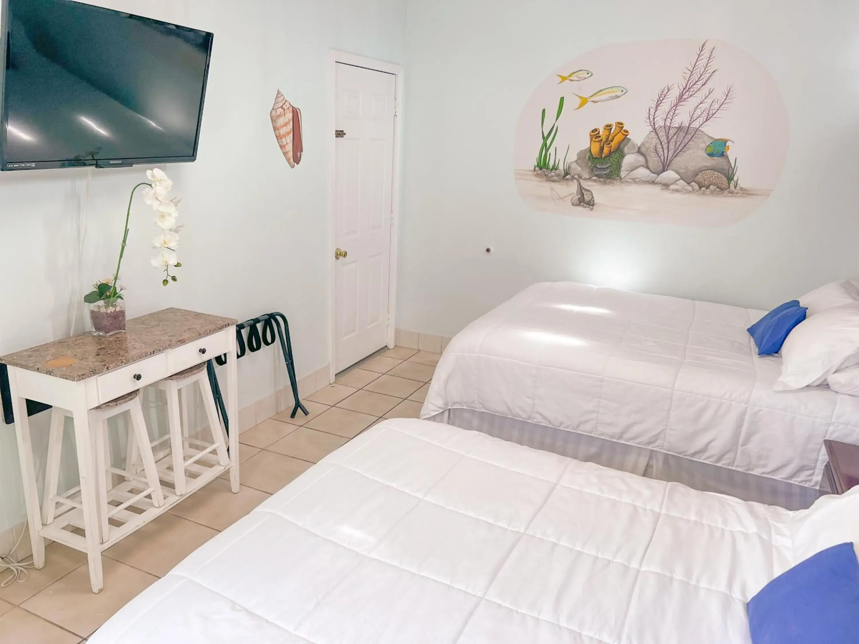 Bed in Sunset Cove Beach Resort Bed in Sunset Cove Beach Resort