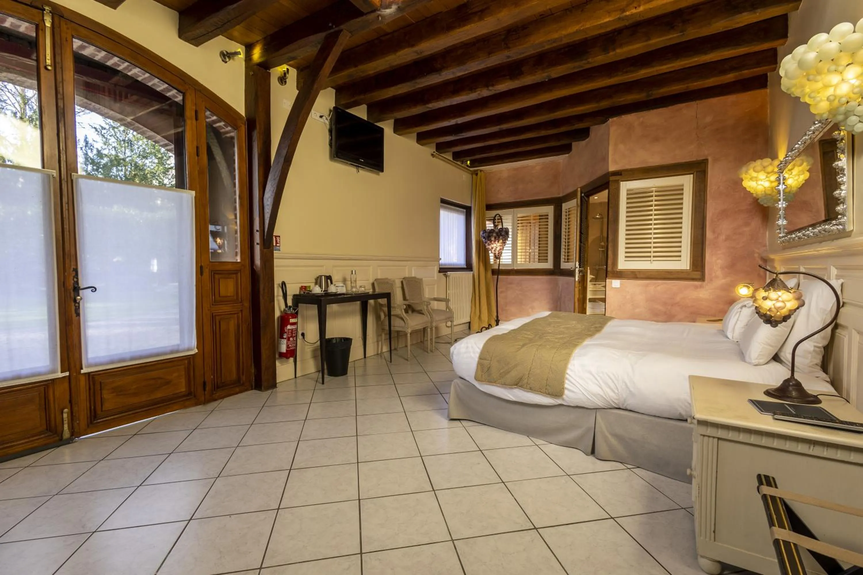 Bed in Les Jardins d'Epicure