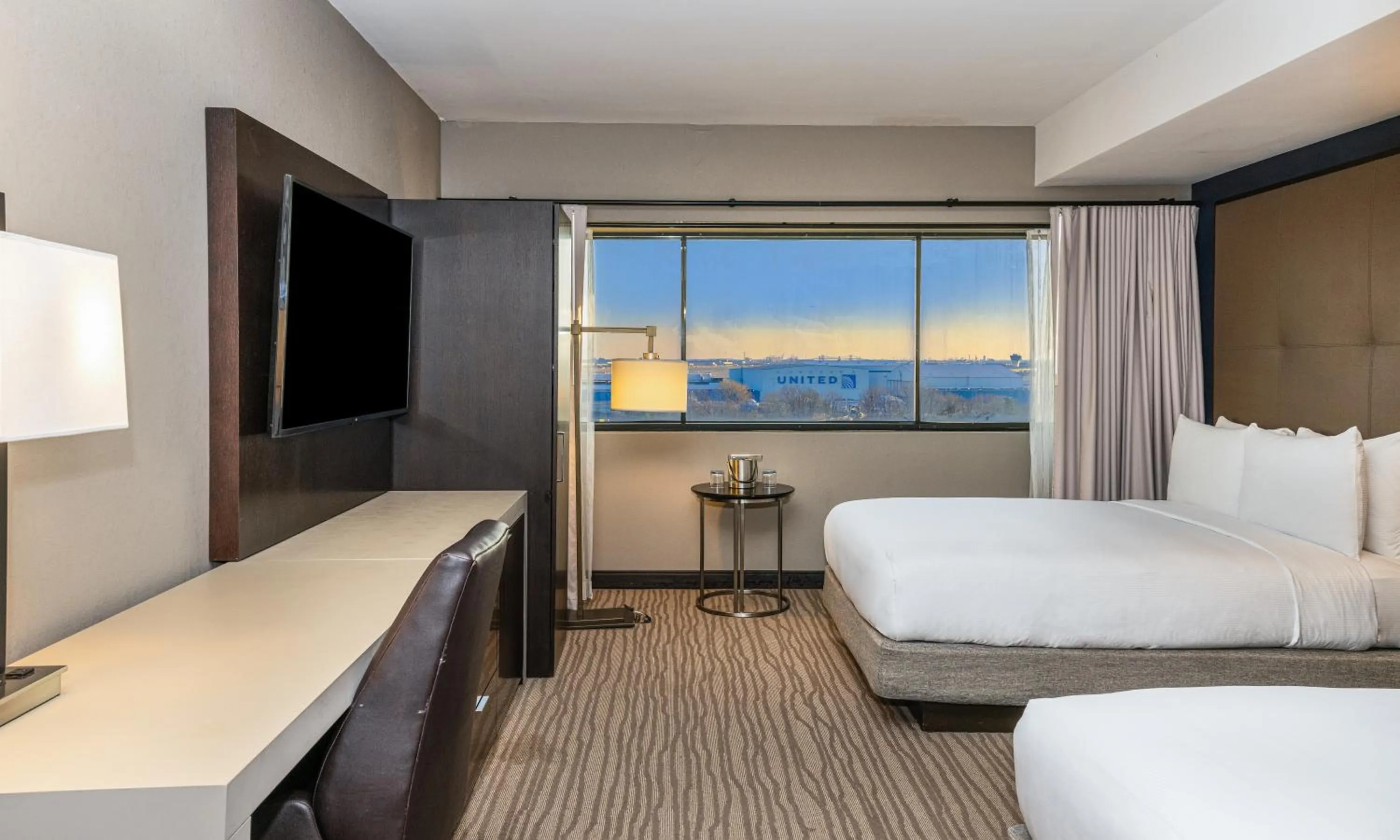 Bed in DoubleTree by Hilton Hotel Newark Airport