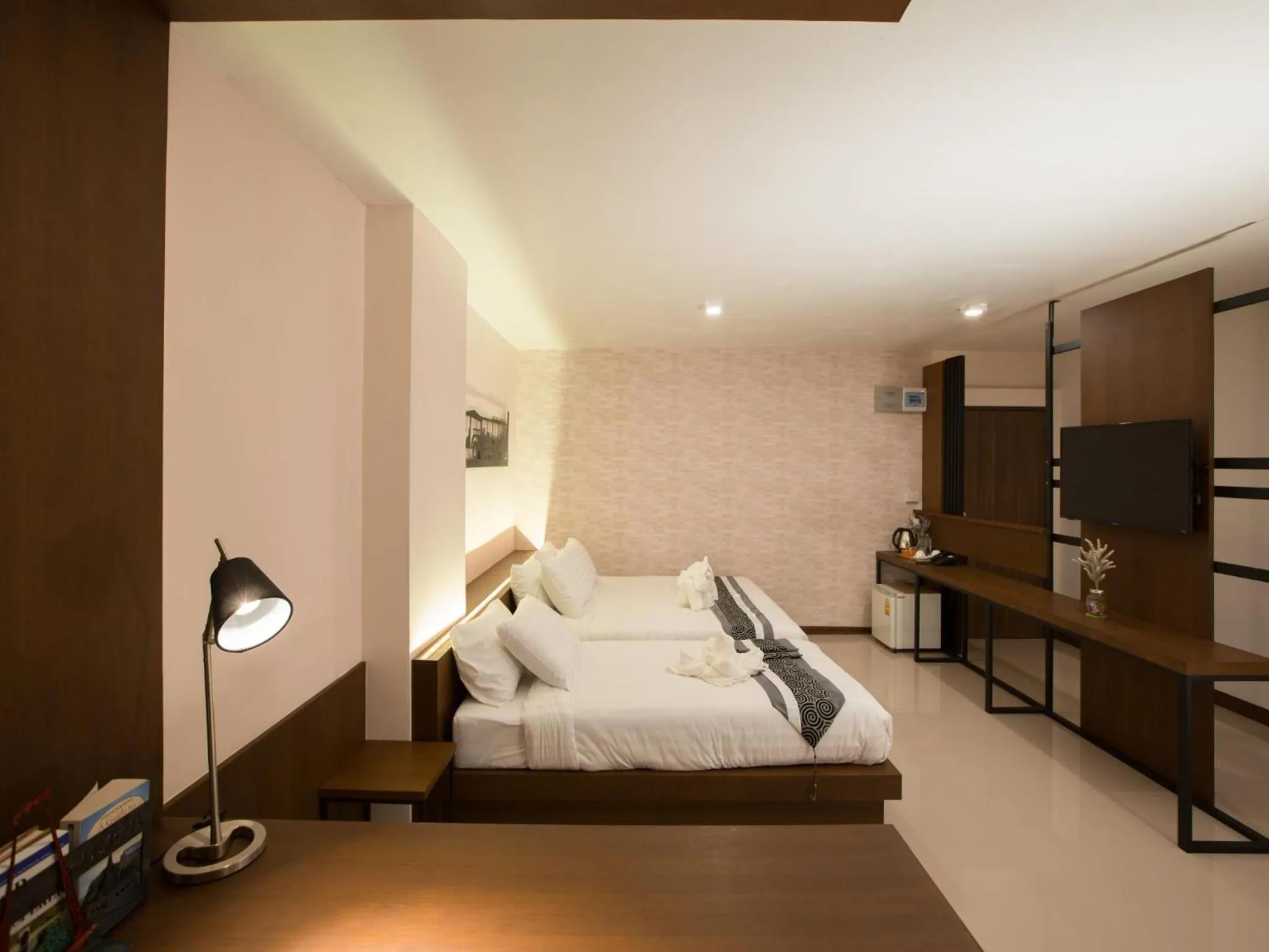 Photo of the whole room, Bed in iChapter Hotel Suvarnabhumi
