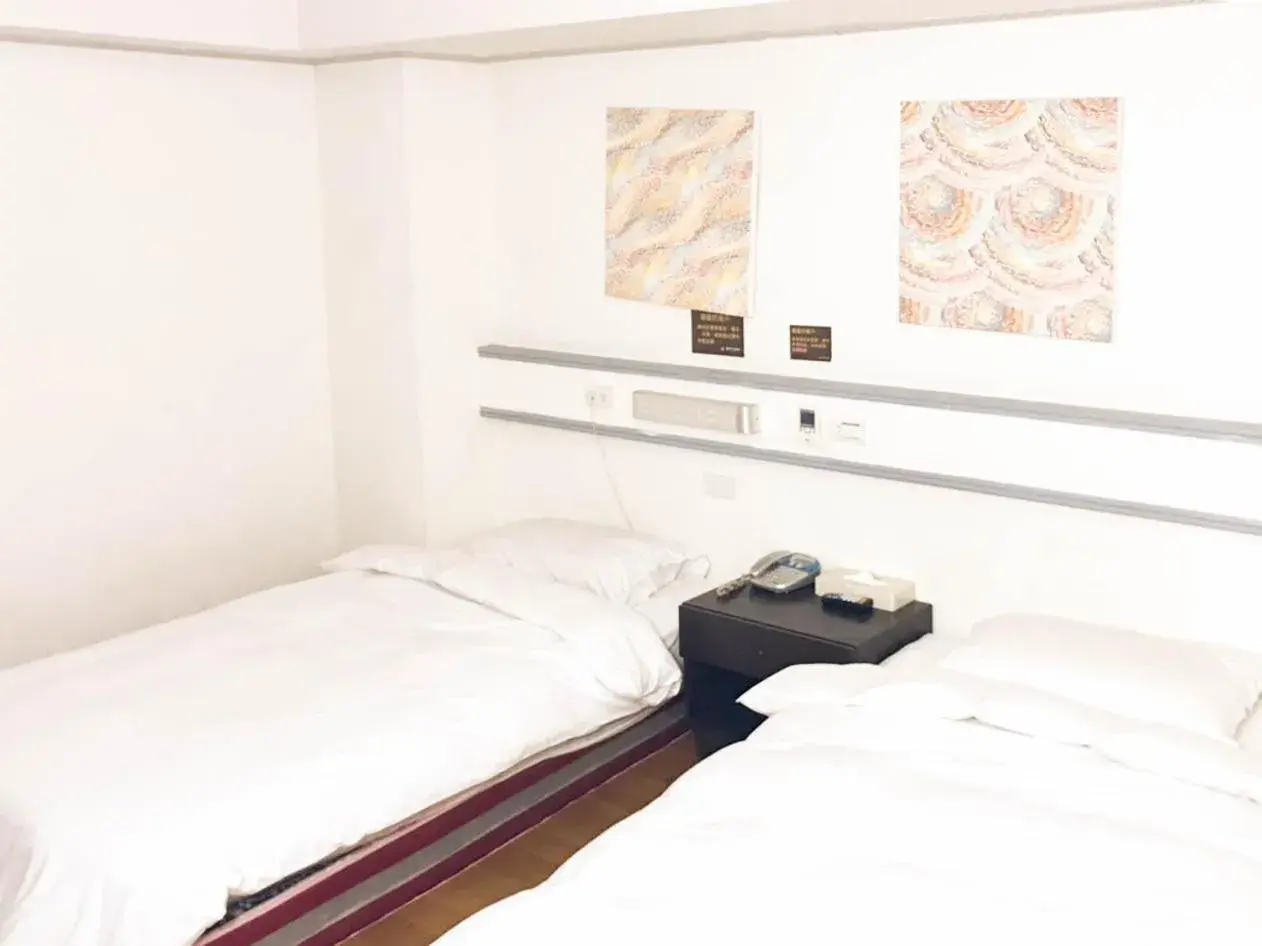 Bed in Fudi Hotel Bed in Fudi Hotel