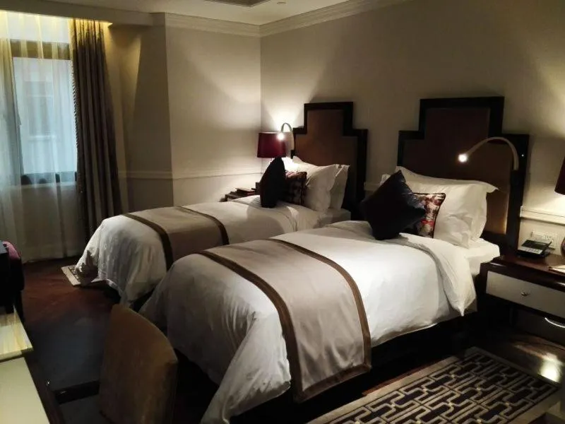 Bed in 上海外滩锦江都城新城饭店 Metropolo Xin Cheng Hotel, The Bund Shanghai