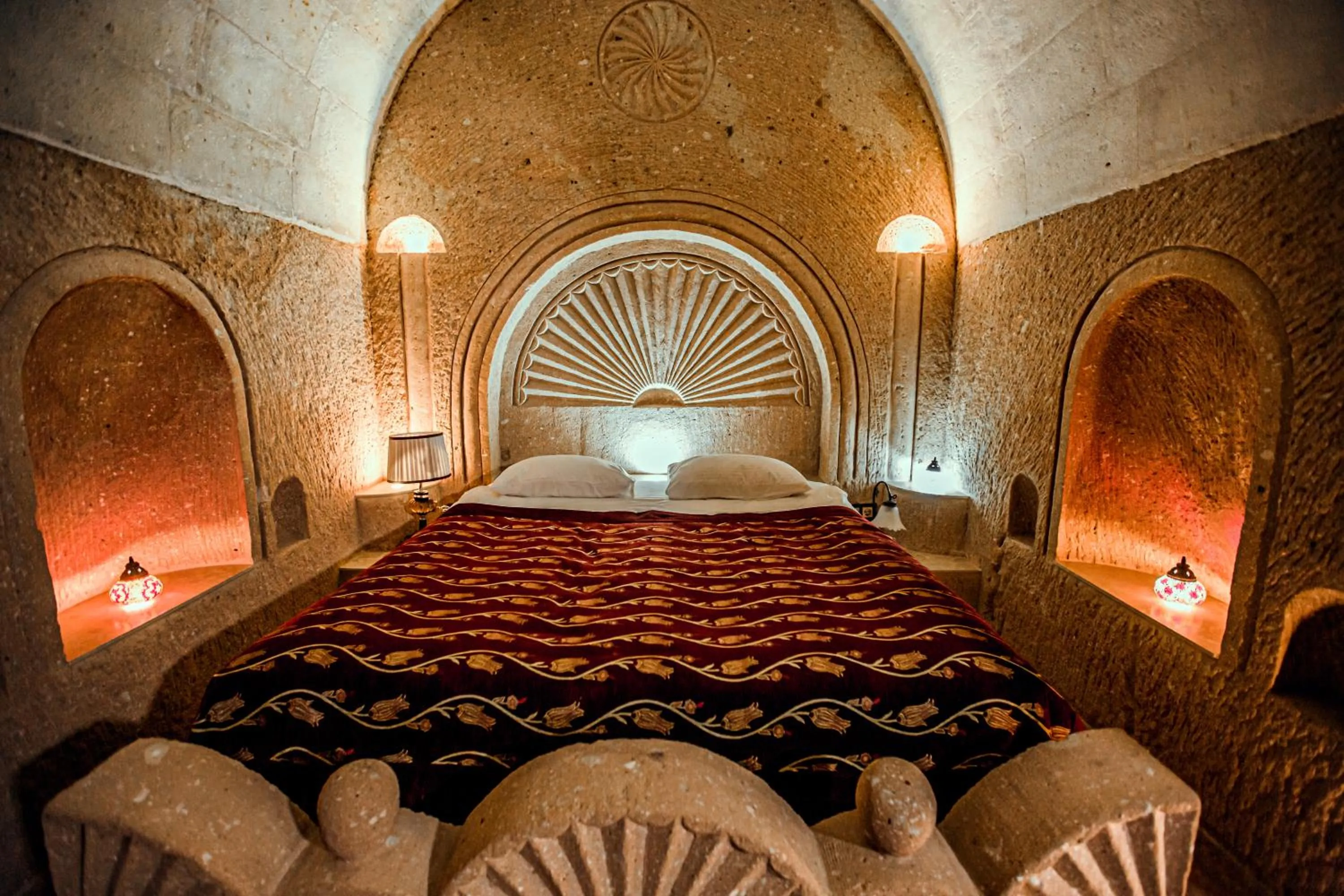 Bed in Oread Cave Suites