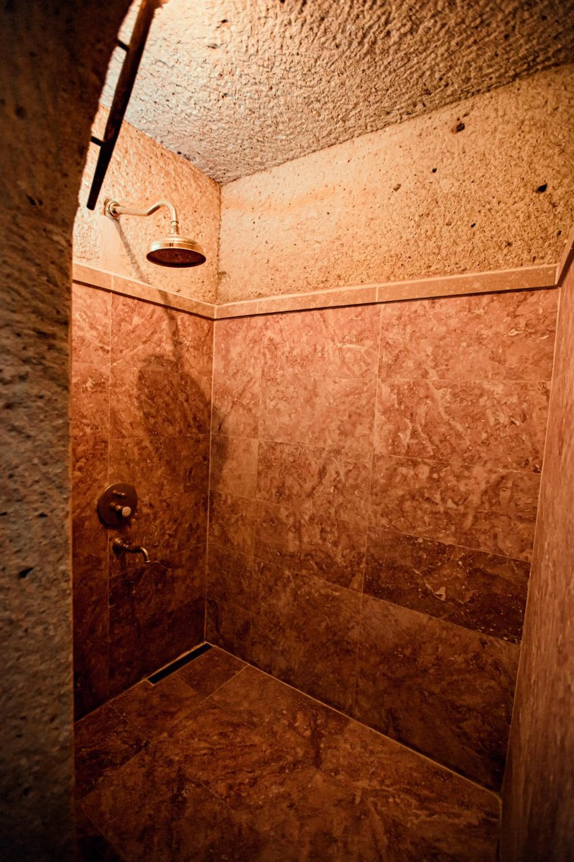 Shower in Oread Cave Suites