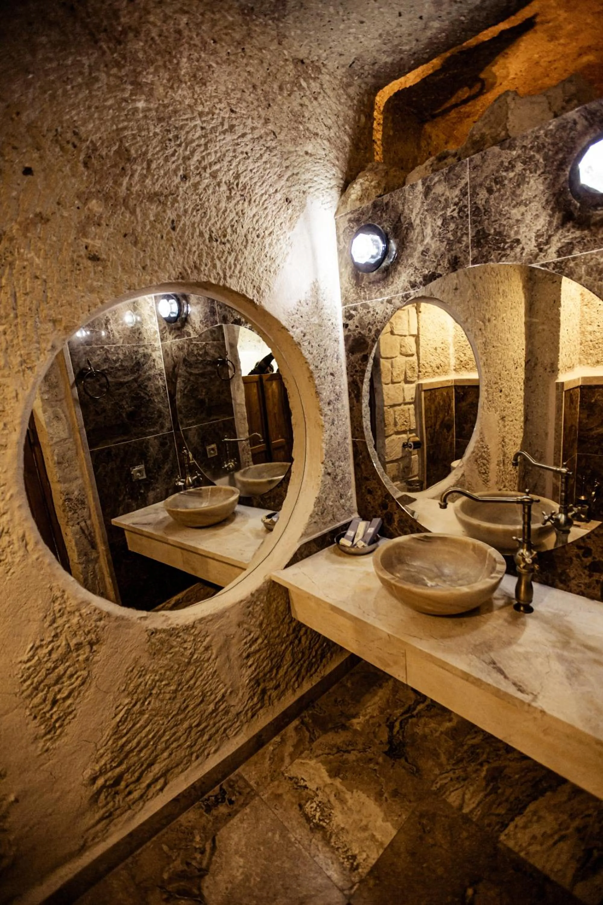 Toilet in Oread Cave Suites