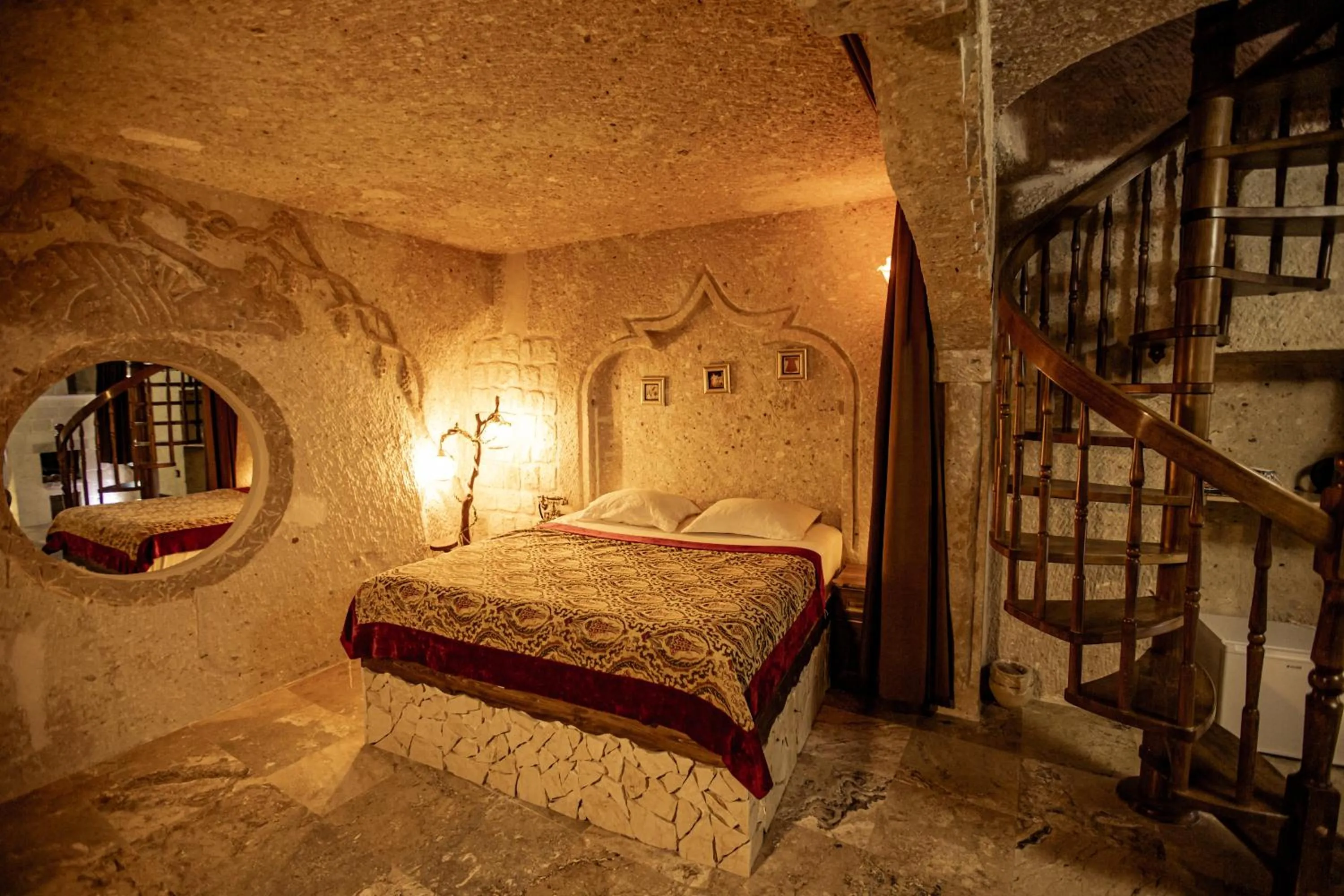 Bed in Oread Cave Suites
