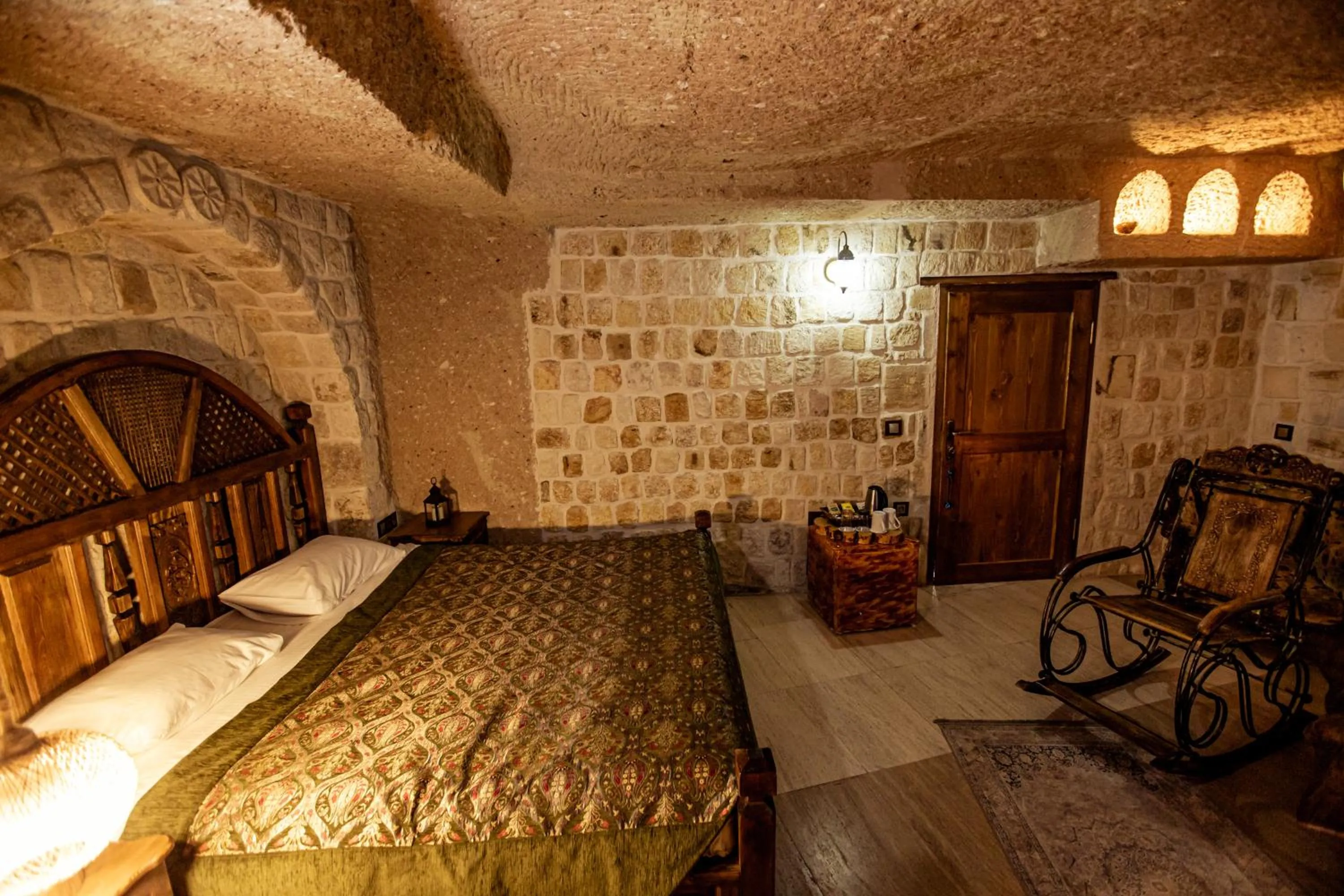 Bed in Oread Cave Suites