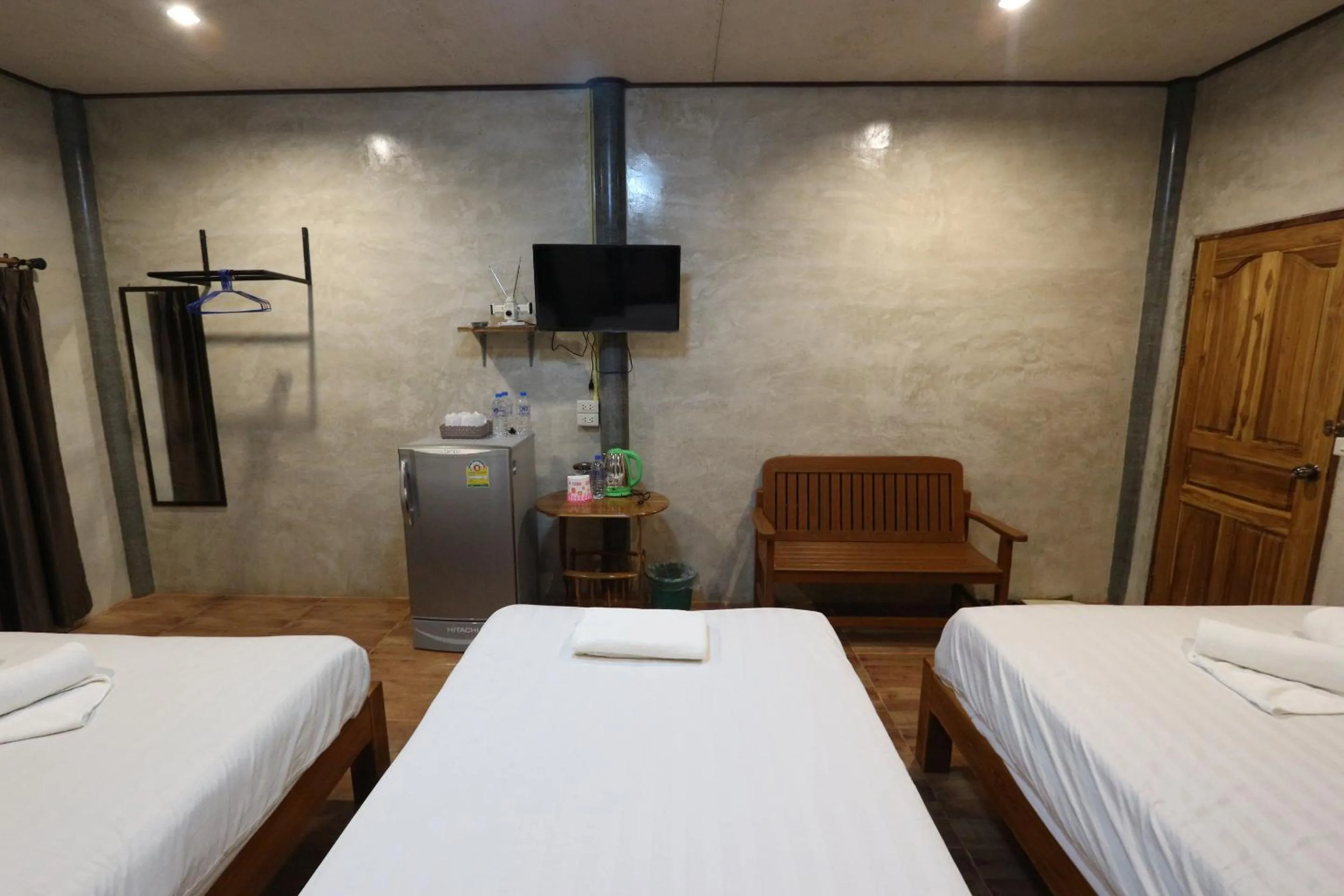 Bed in Baan Khue Wieng Resort