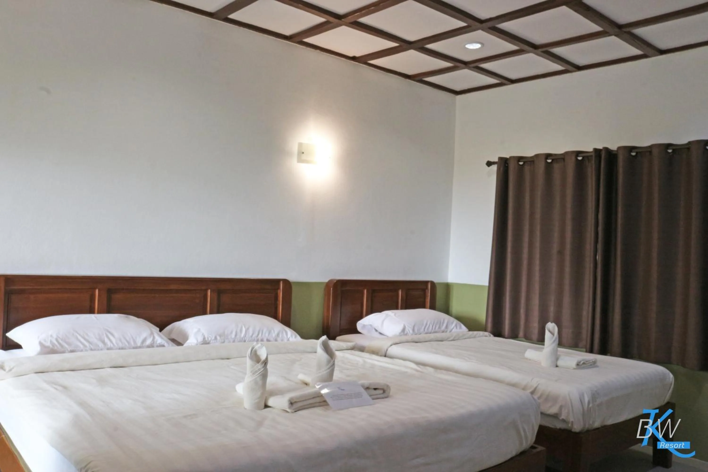 Bed in Baan Khue Wieng Resort