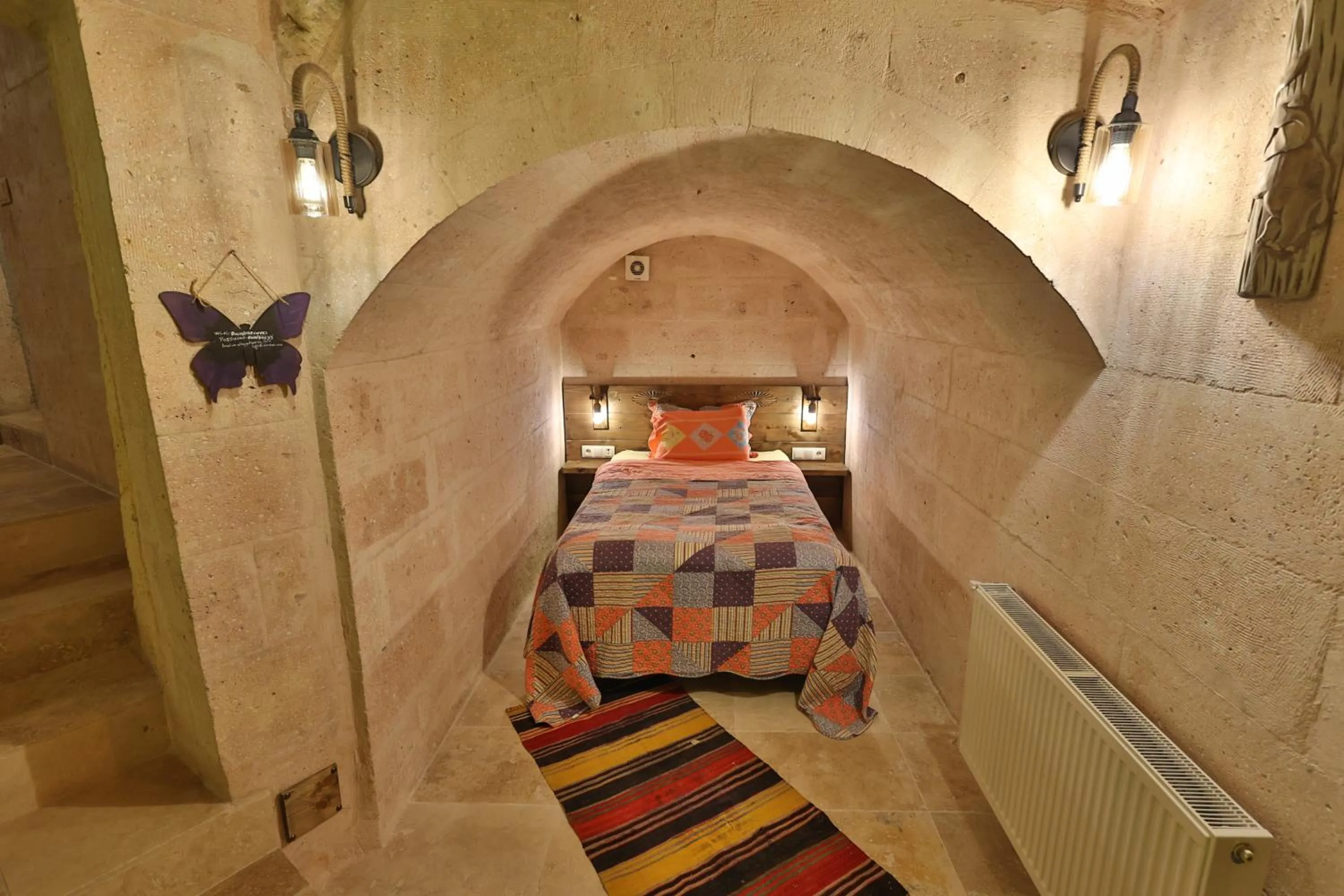 Photo of the whole room, Bed in Demisos Caves Hotel