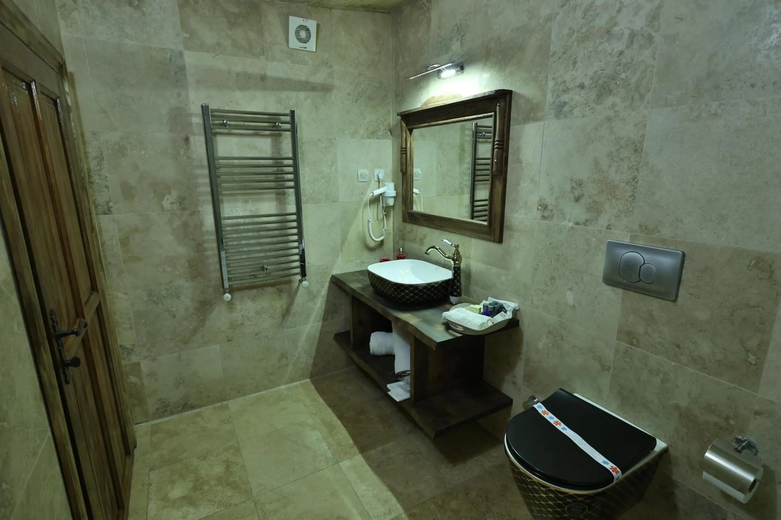 Photo of the whole room in Demisos Caves Hotel