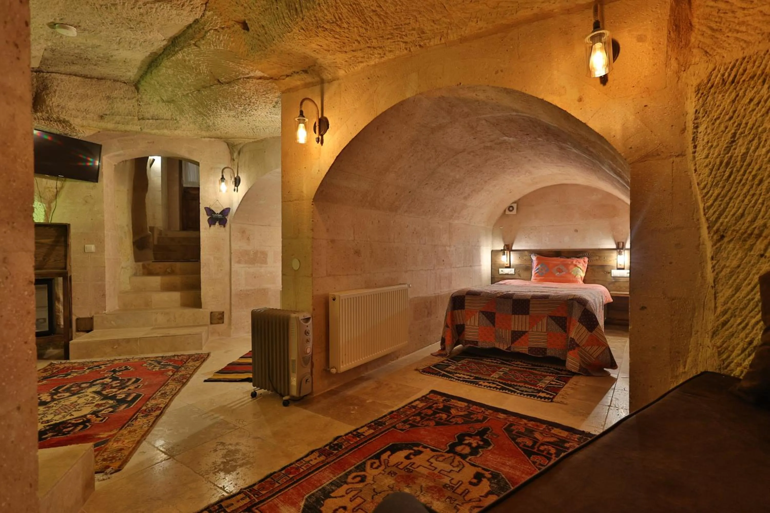 Photo of the whole room, Bed in Demisos Caves Hotel