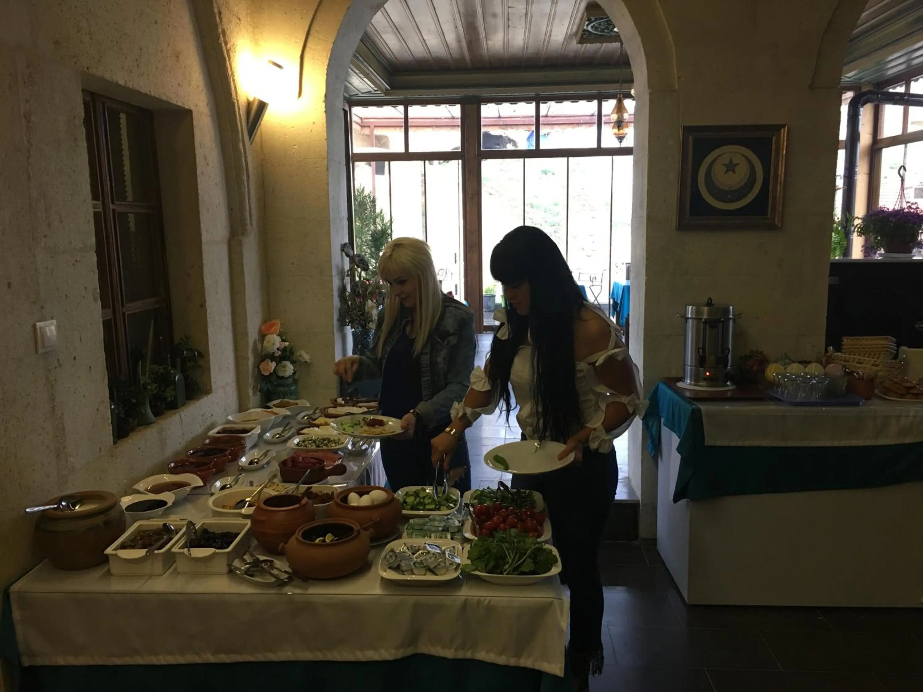 Buffet breakfast in Demisos Caves Hotel