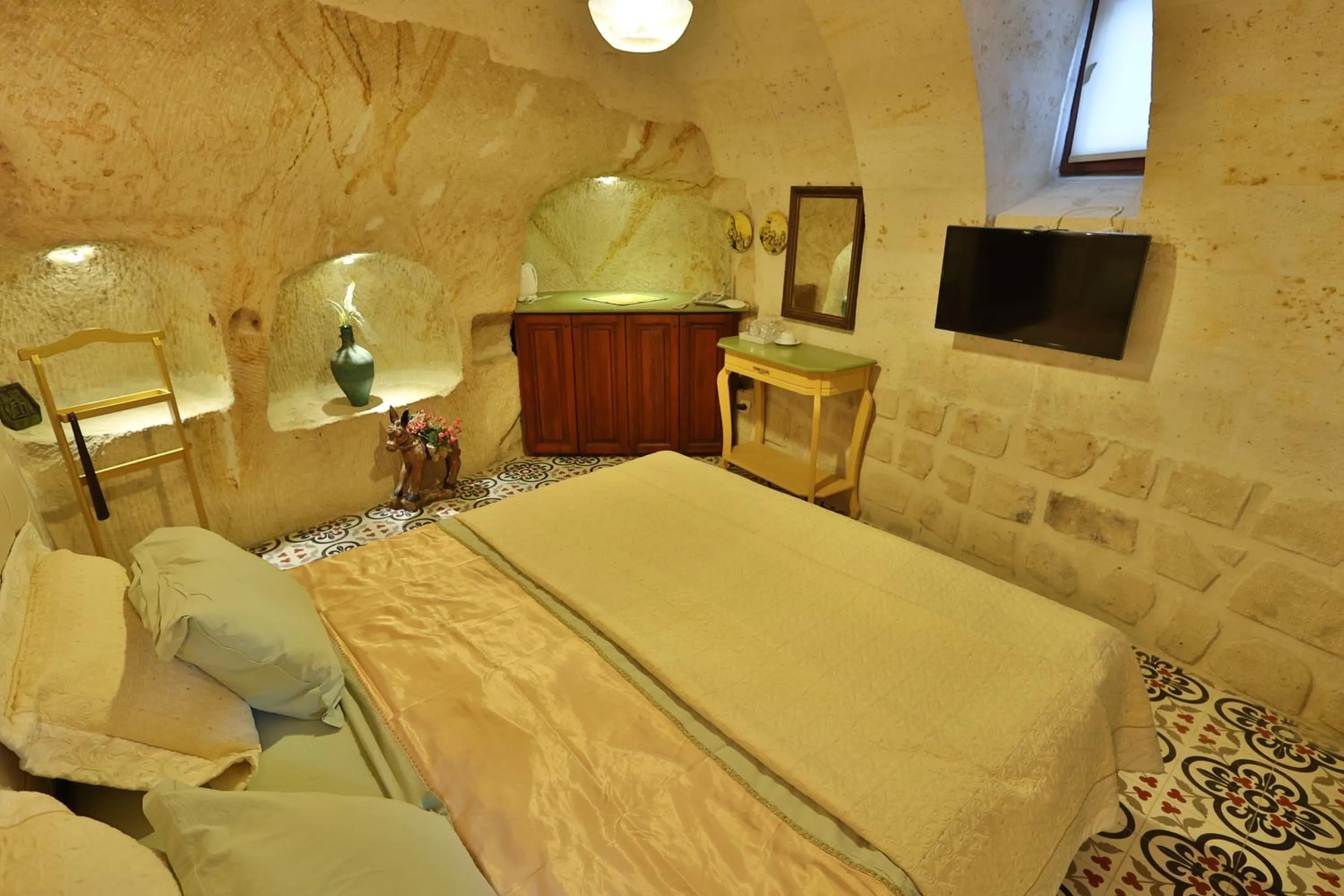 Photo of the whole room, Bed in Demisos Caves Hotel
