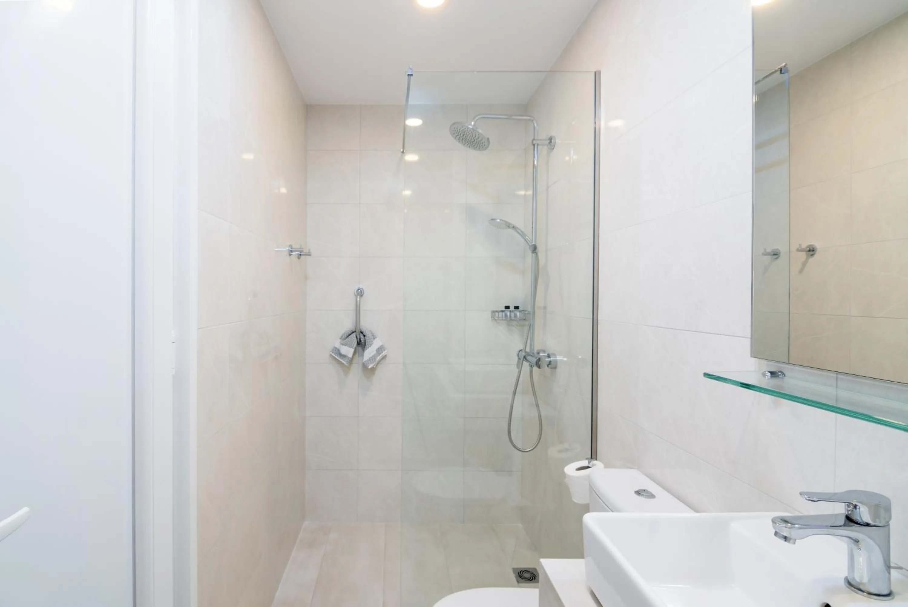 Shower, Bathroom in Helion Apartments