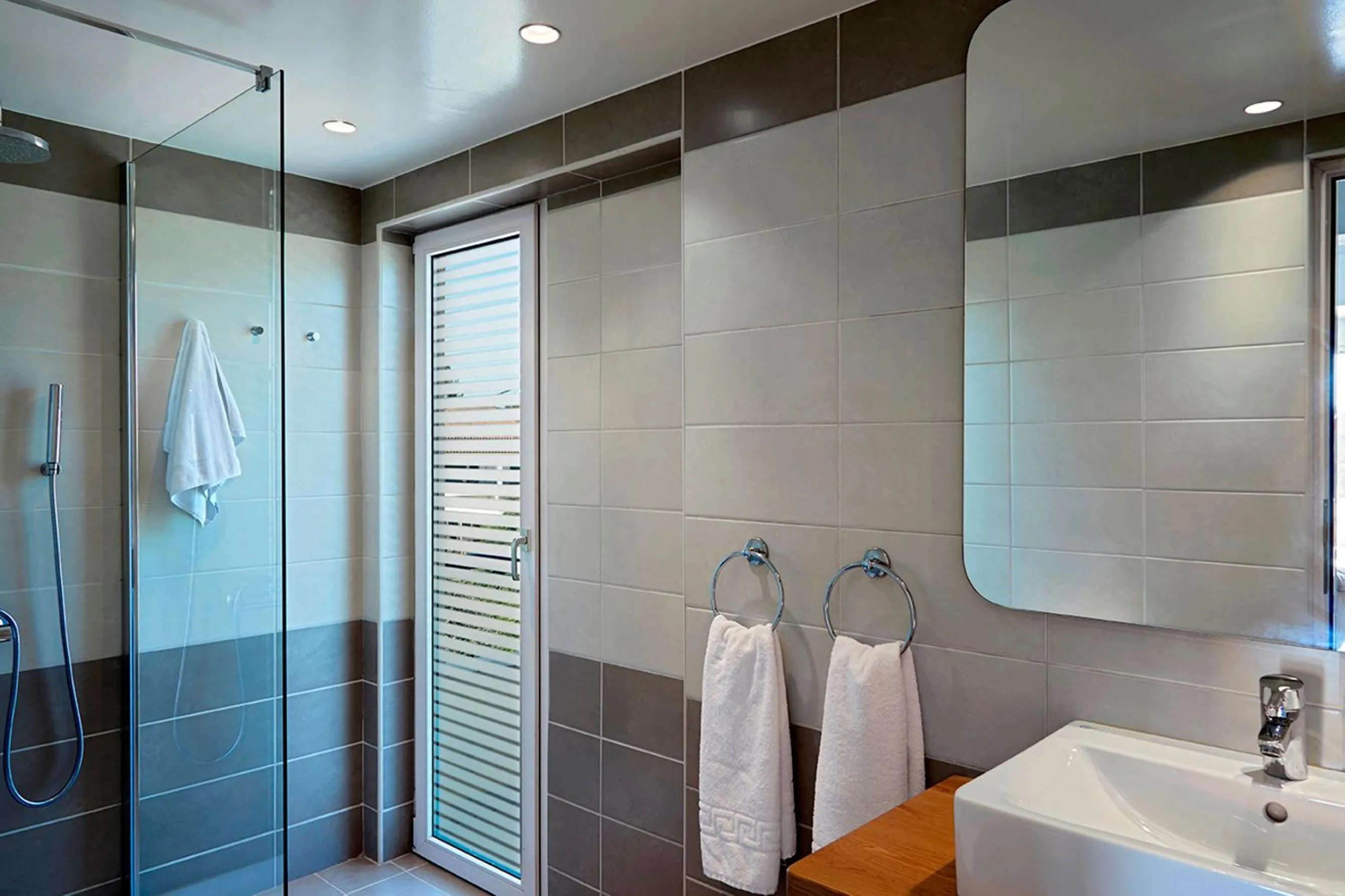 Shower, Bathroom in Helion Apartments
