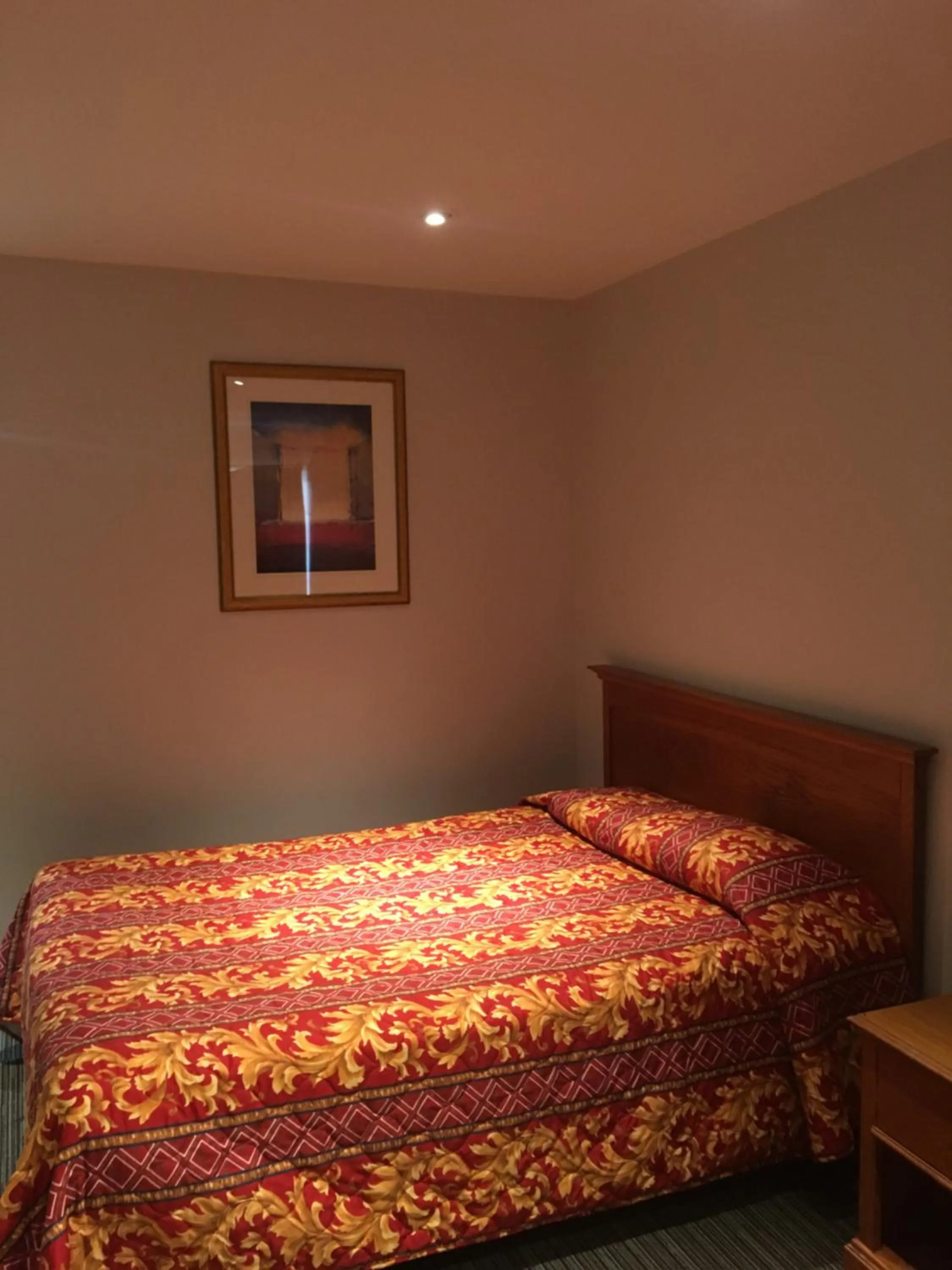 Bed in Century Inn at LAX