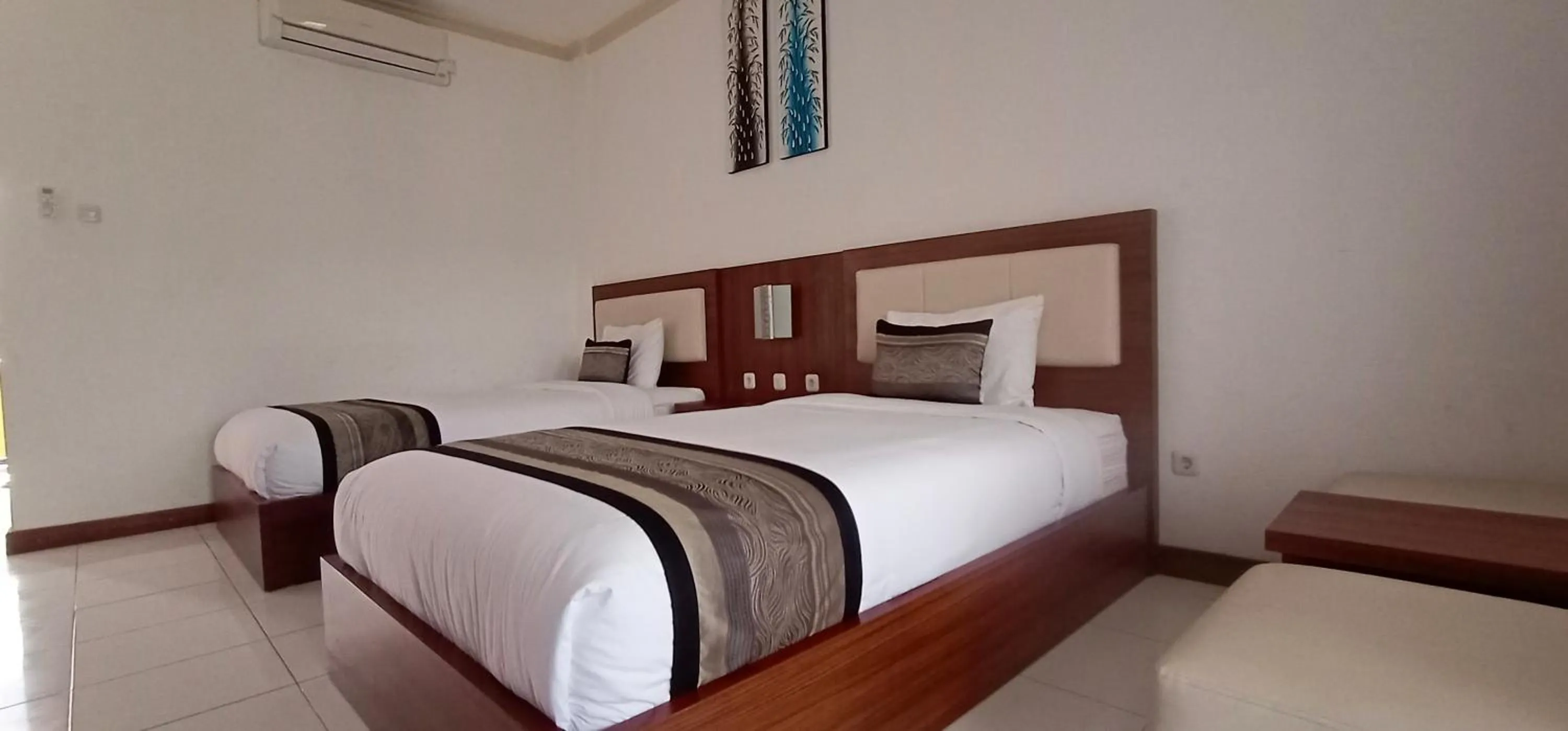 Bed in Friends Beach Hotel