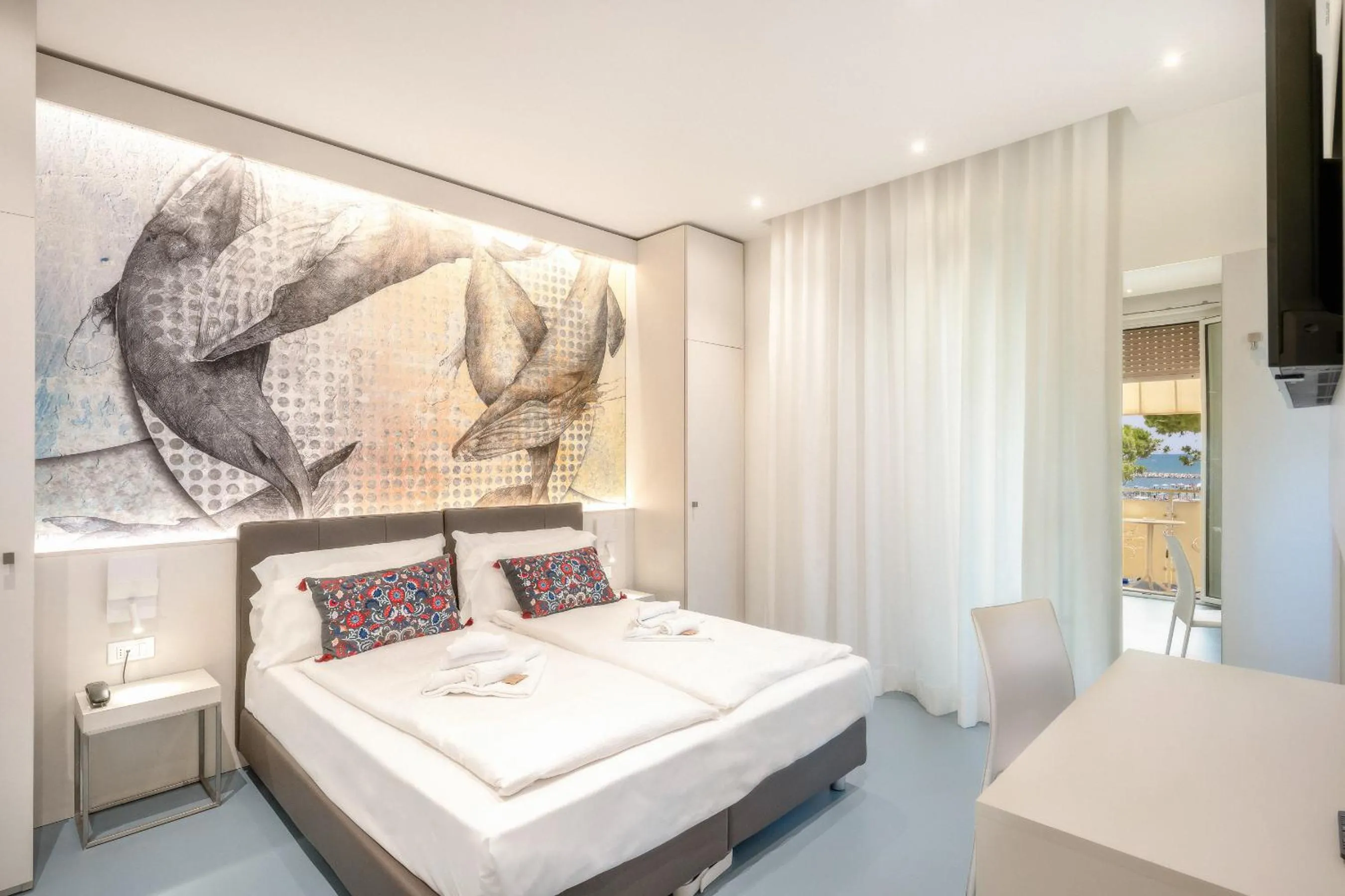 Bed in Hotel Le Lampare