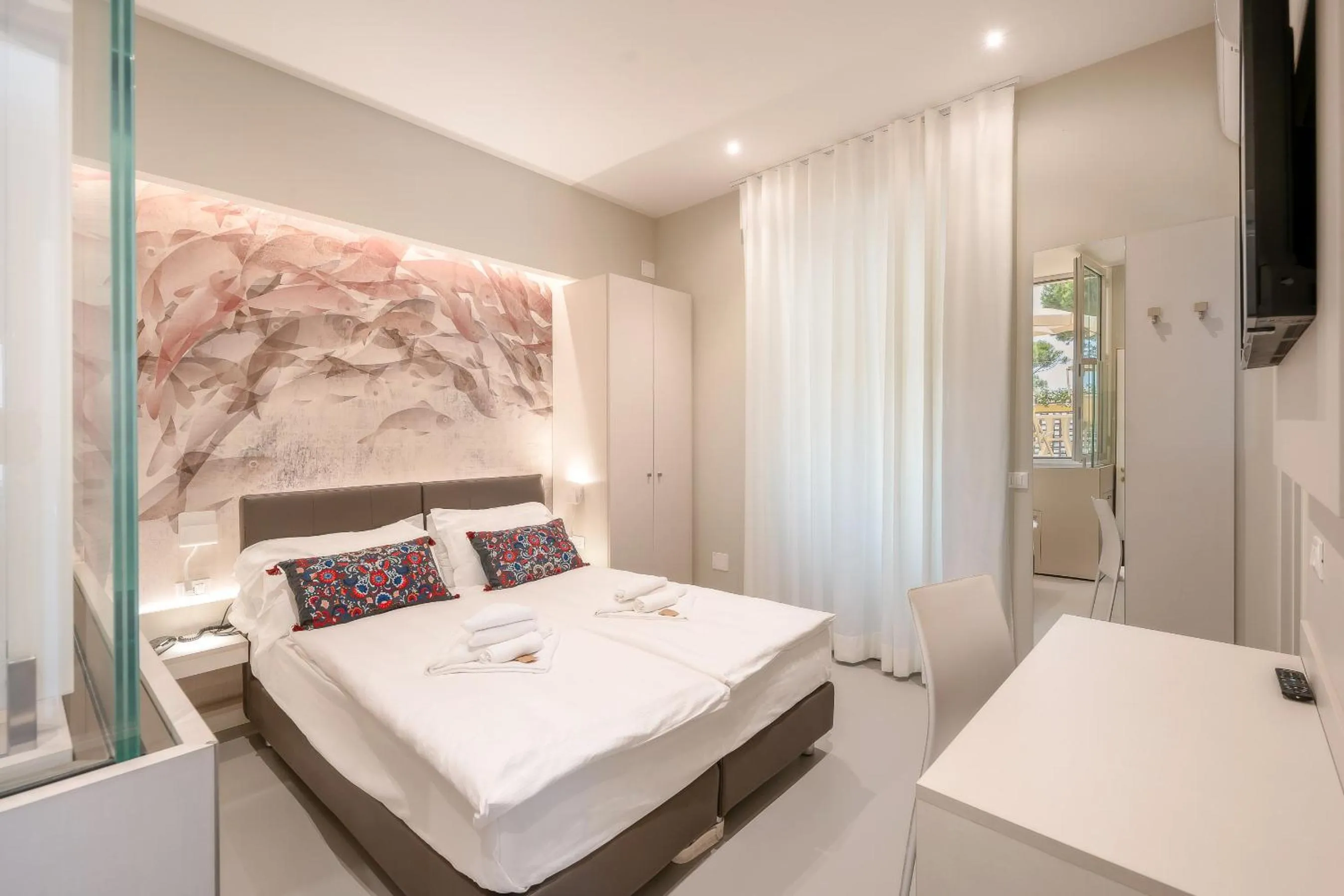 Bedroom in Hotel Le Lampare